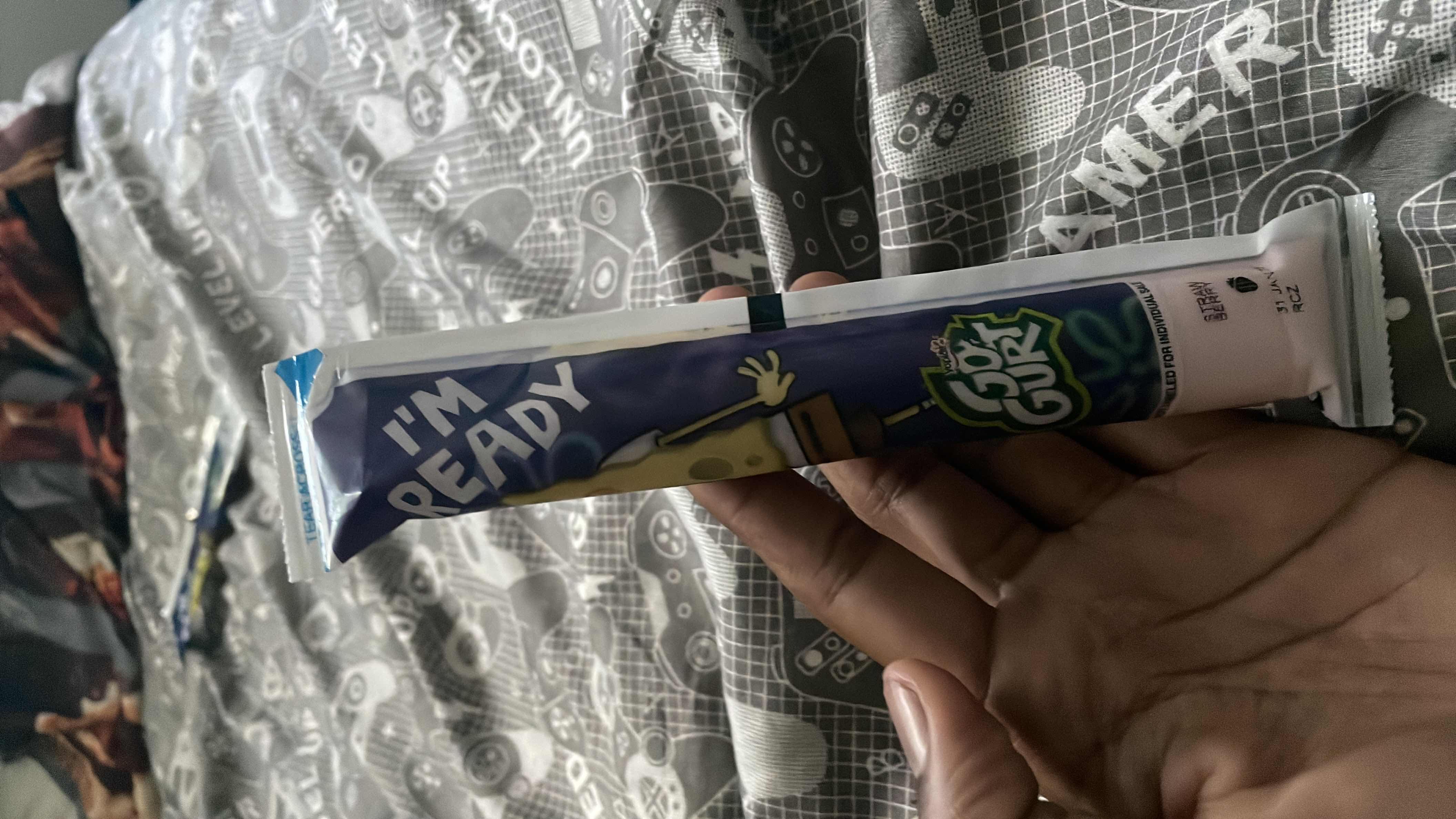 This is a single-serving strawberry-flavored Go-Gurt yogurt tube, providing a low-calorie snack with moderate protein and carbohydrates.