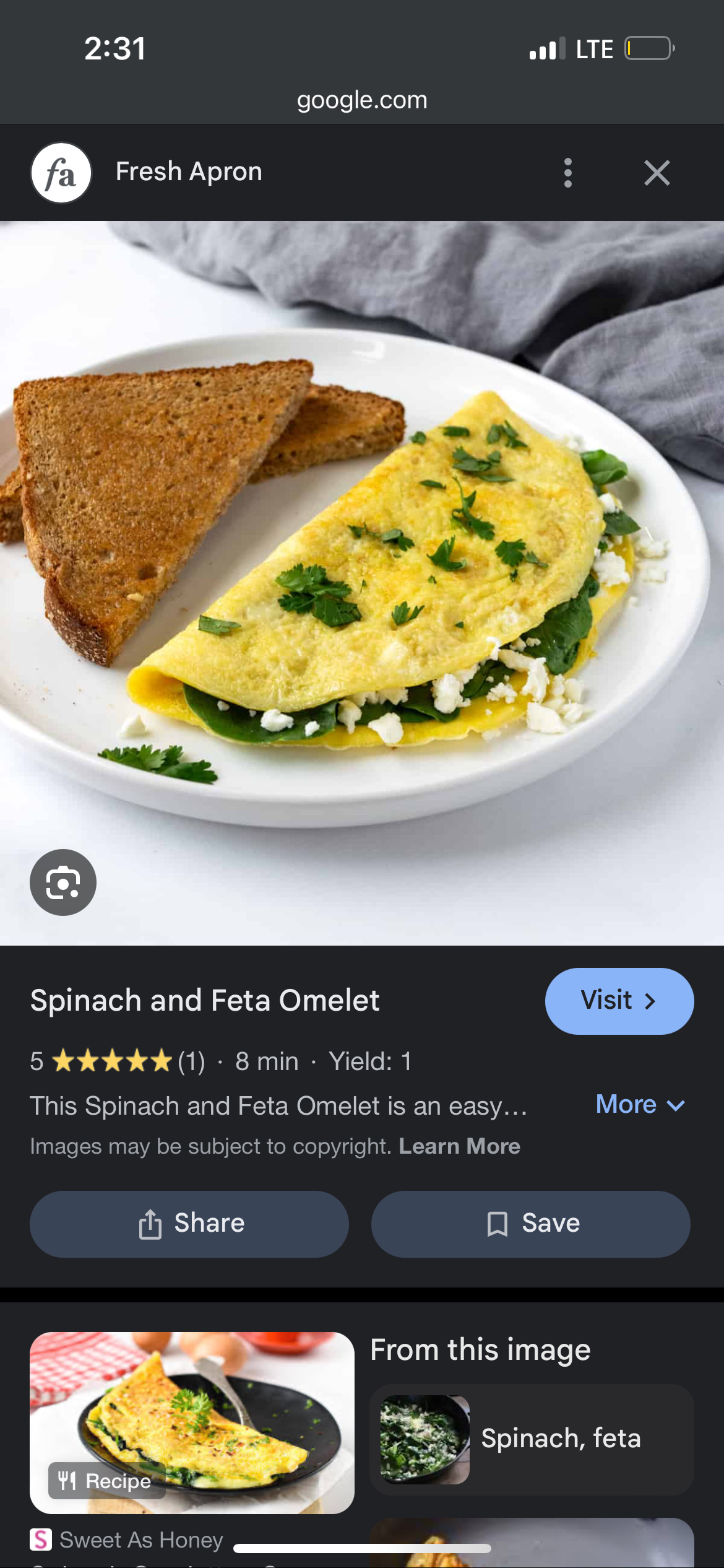 A nutritious spinach and feta omelet served with whole wheat toast, providing a balanced mix of protein, carbs, and healthy fats.