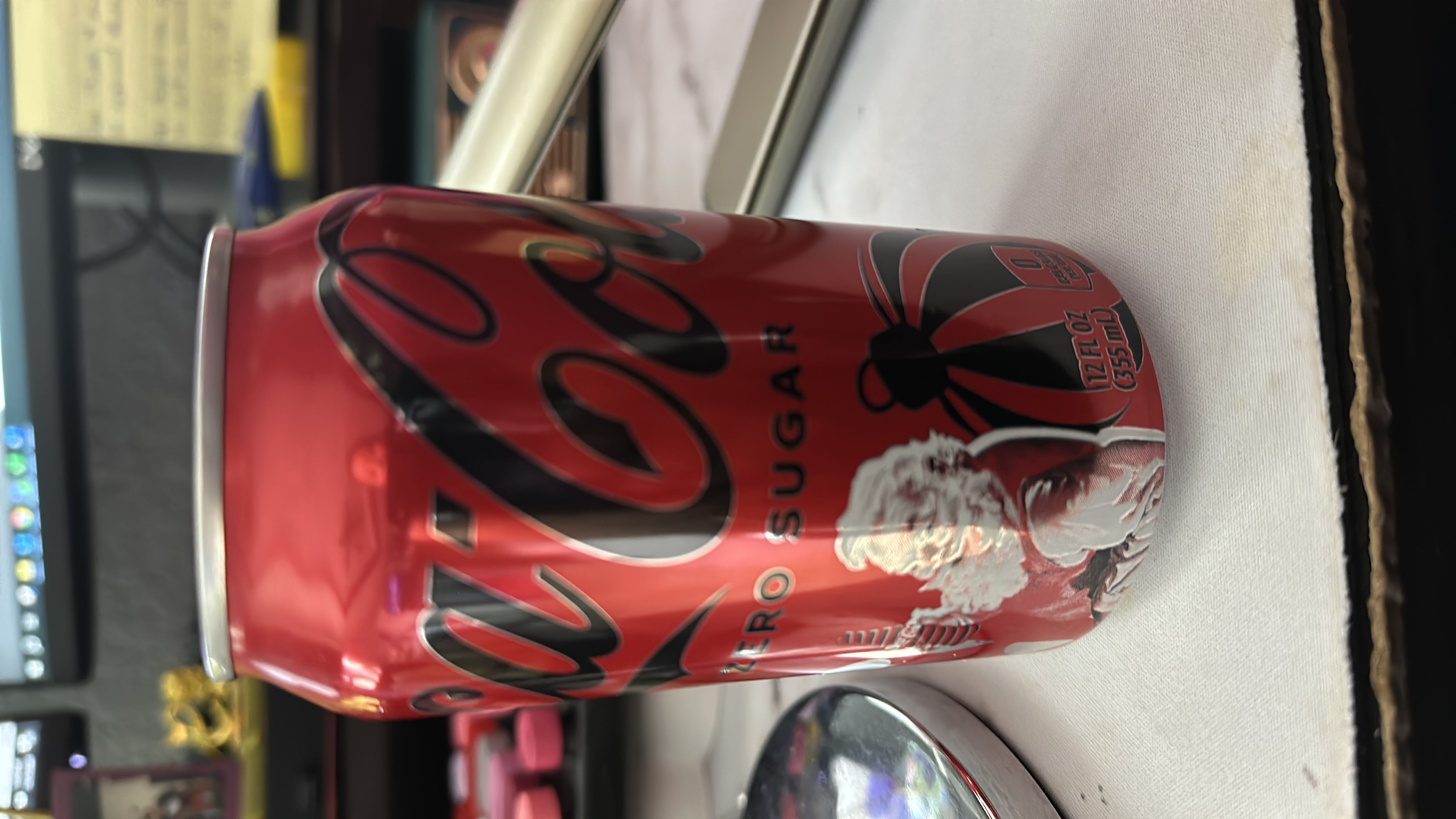 A 12 fl oz (355 mL) can of Coca-Cola Zero Sugar, containing zero calories, zero protein, zero carbs, and zero fats.