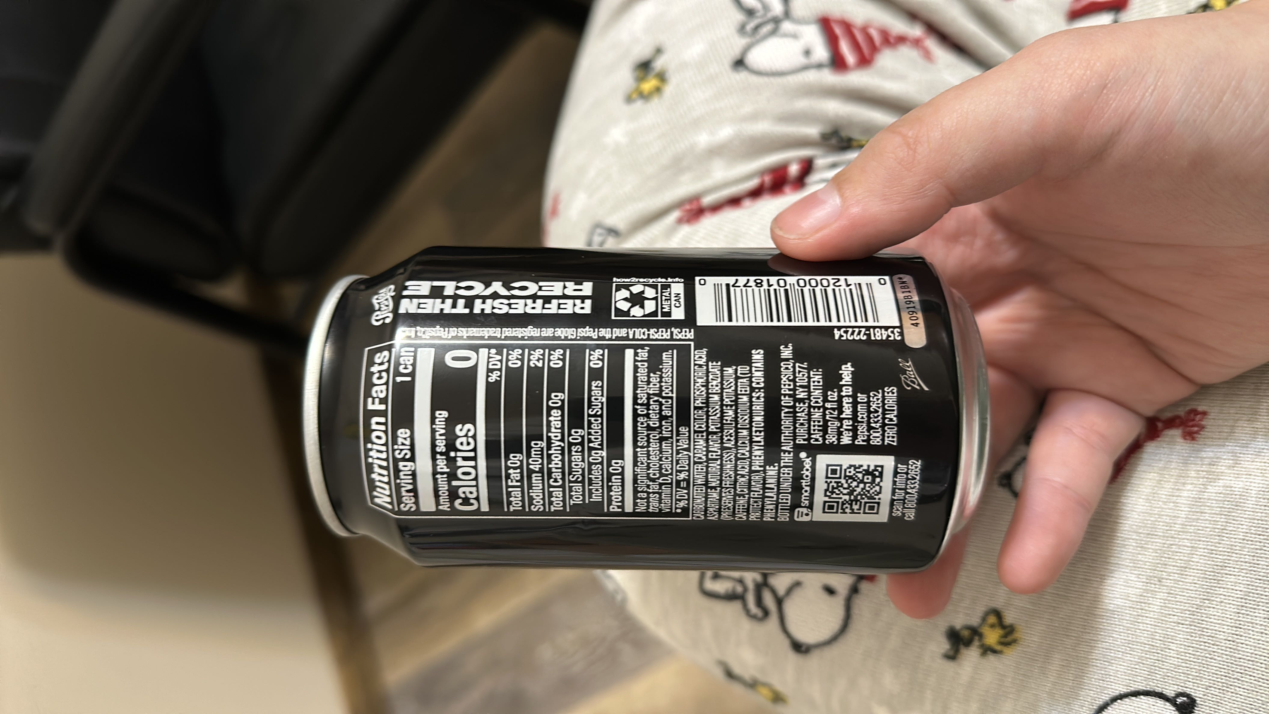 This is a zero-calorie carbonated beverage with no fats, carbs, or protein, containing artificial sweeteners, preservatives, and sodium.
