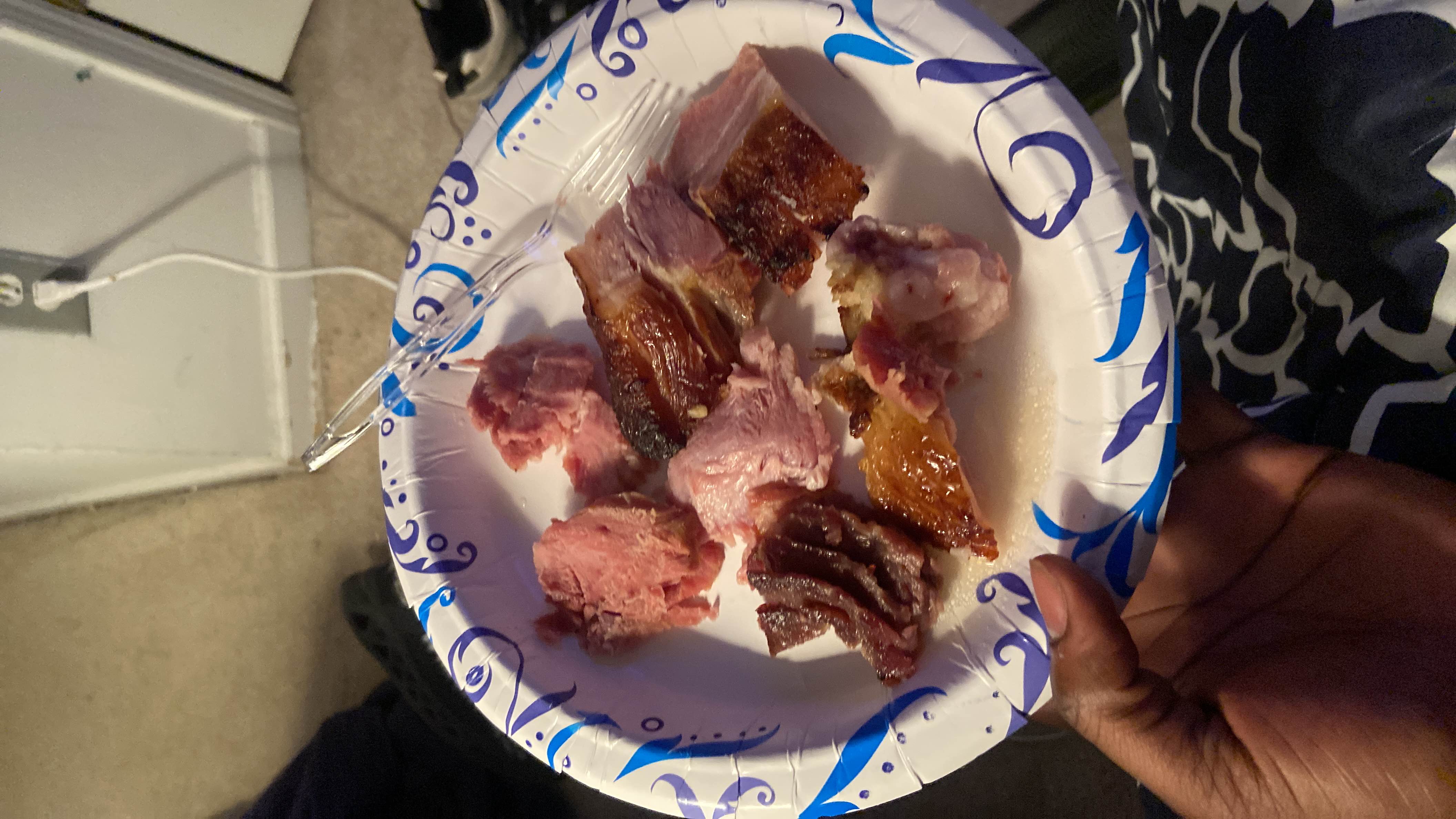 A plate containing smoked pork and roasted beef, high in protein and fats with no carbohydrates.