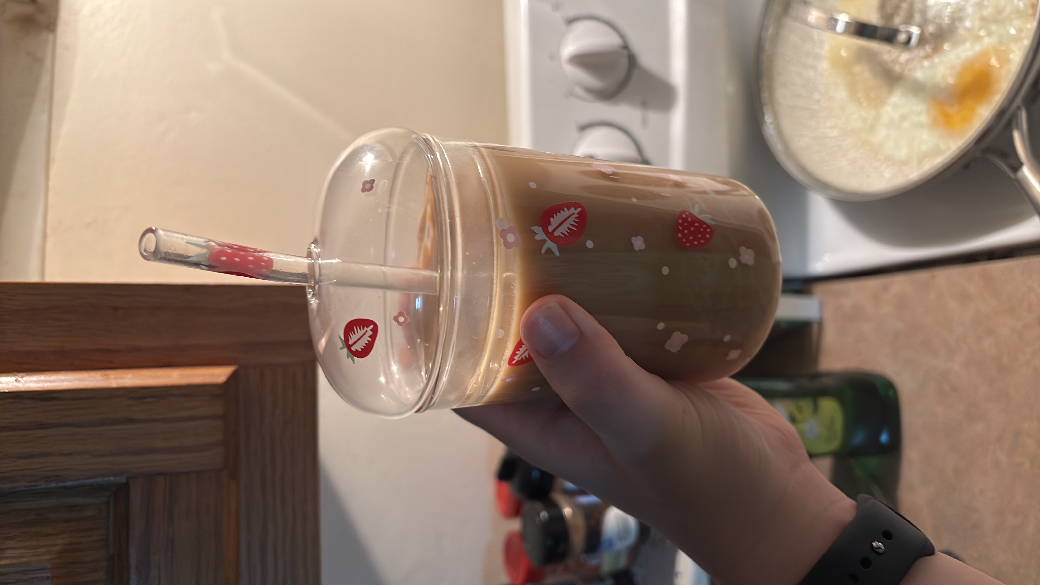 A glass of iced coffee with unsweetened almond milk and creamer, providing a lower calorie count and a balanced mix of macronutrients.