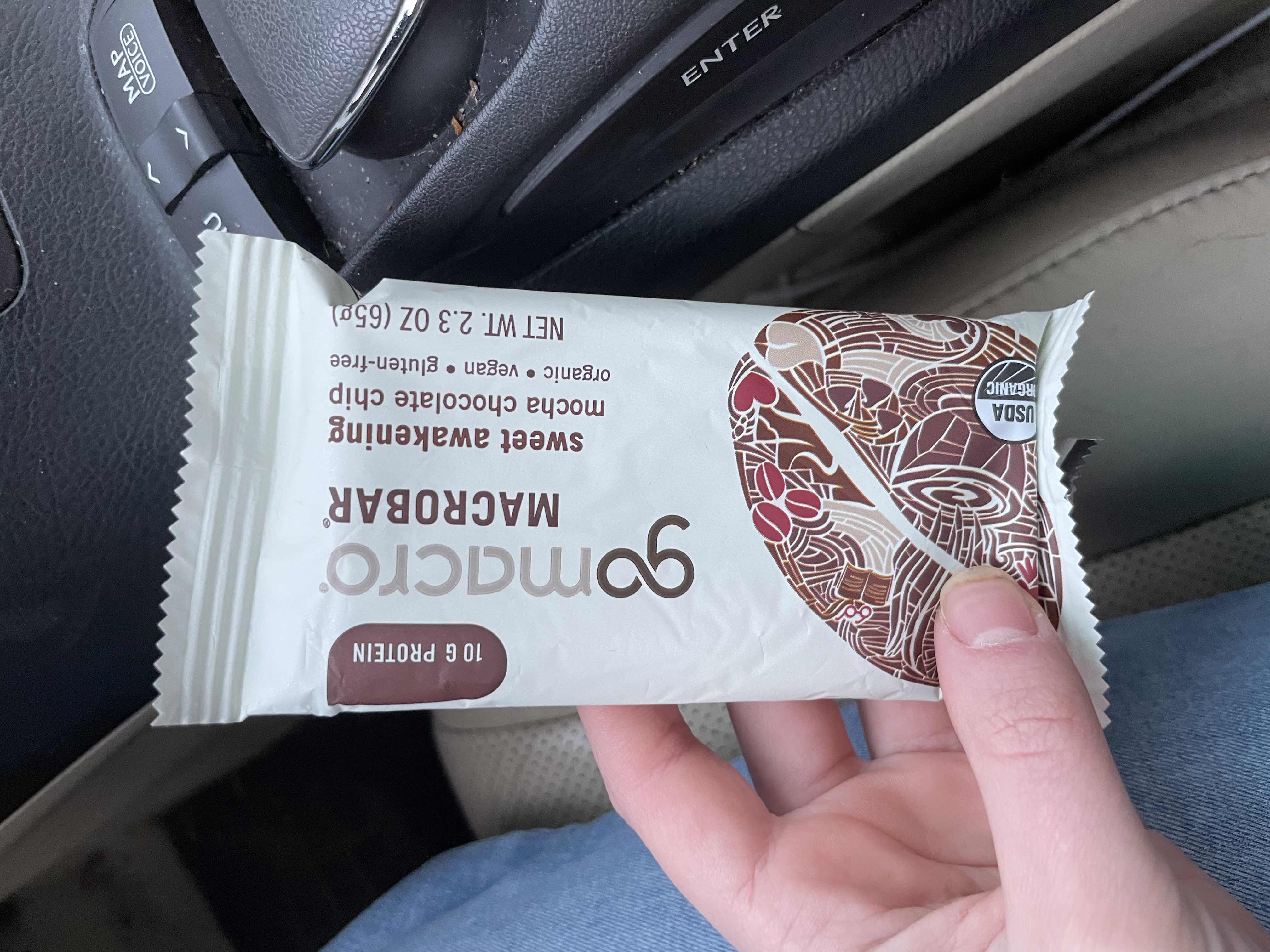 The image shows a GoMacro MacroBar with 260 calories, 10g protein, 35g carbs, and 9g fats. It is organic, vegan, and gluten-free.
