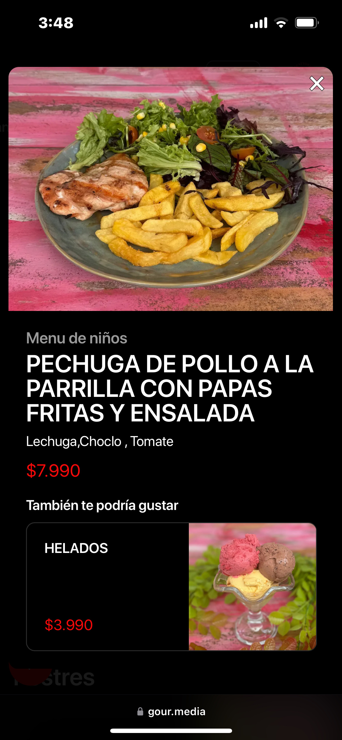 A balanced meal consisting of grilled chicken breast, French fries, and a fresh salad with lettuce, corn, and tomato.