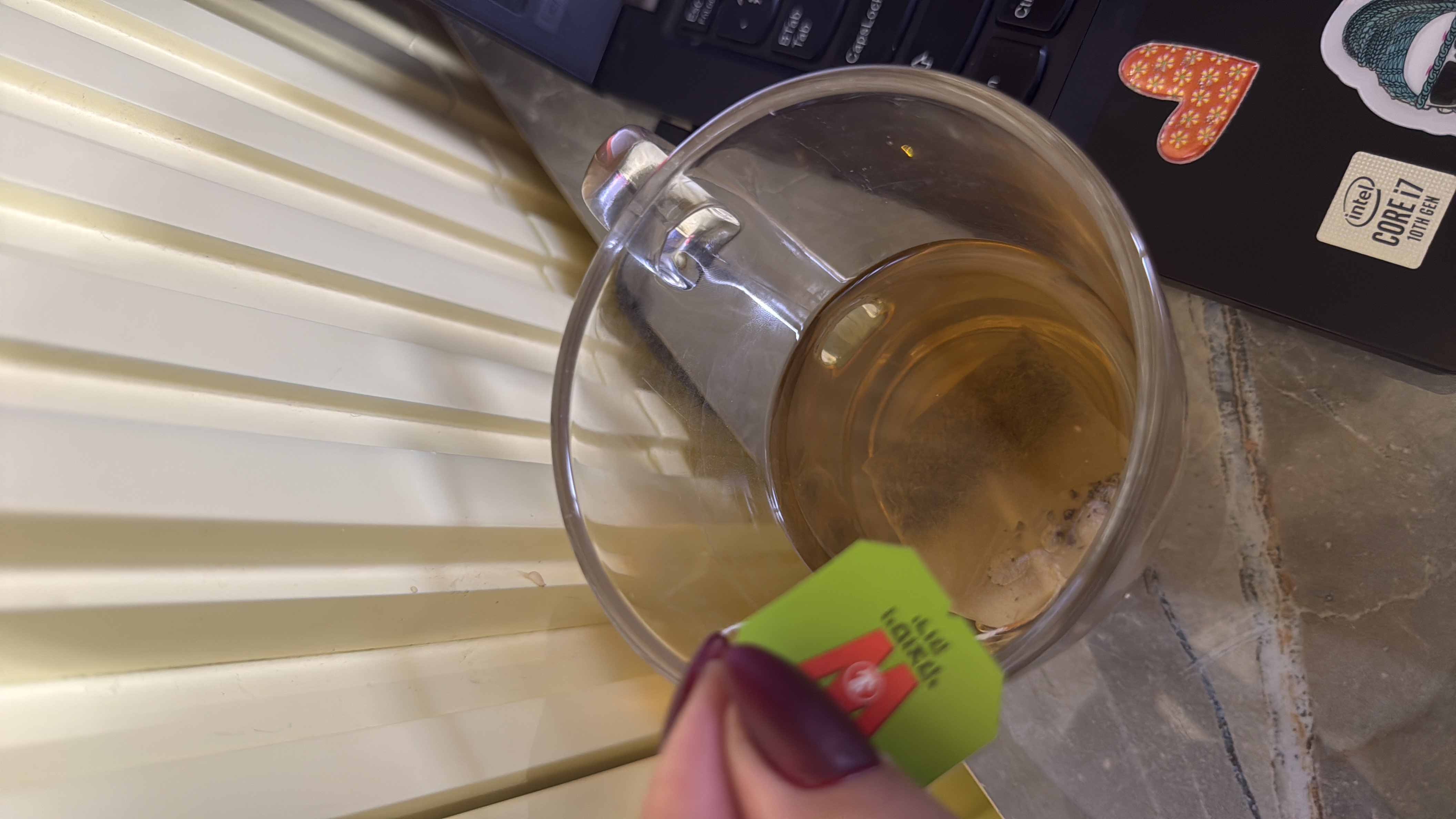 A cup of green tea, a low-calorie beverage known for its health benefits.