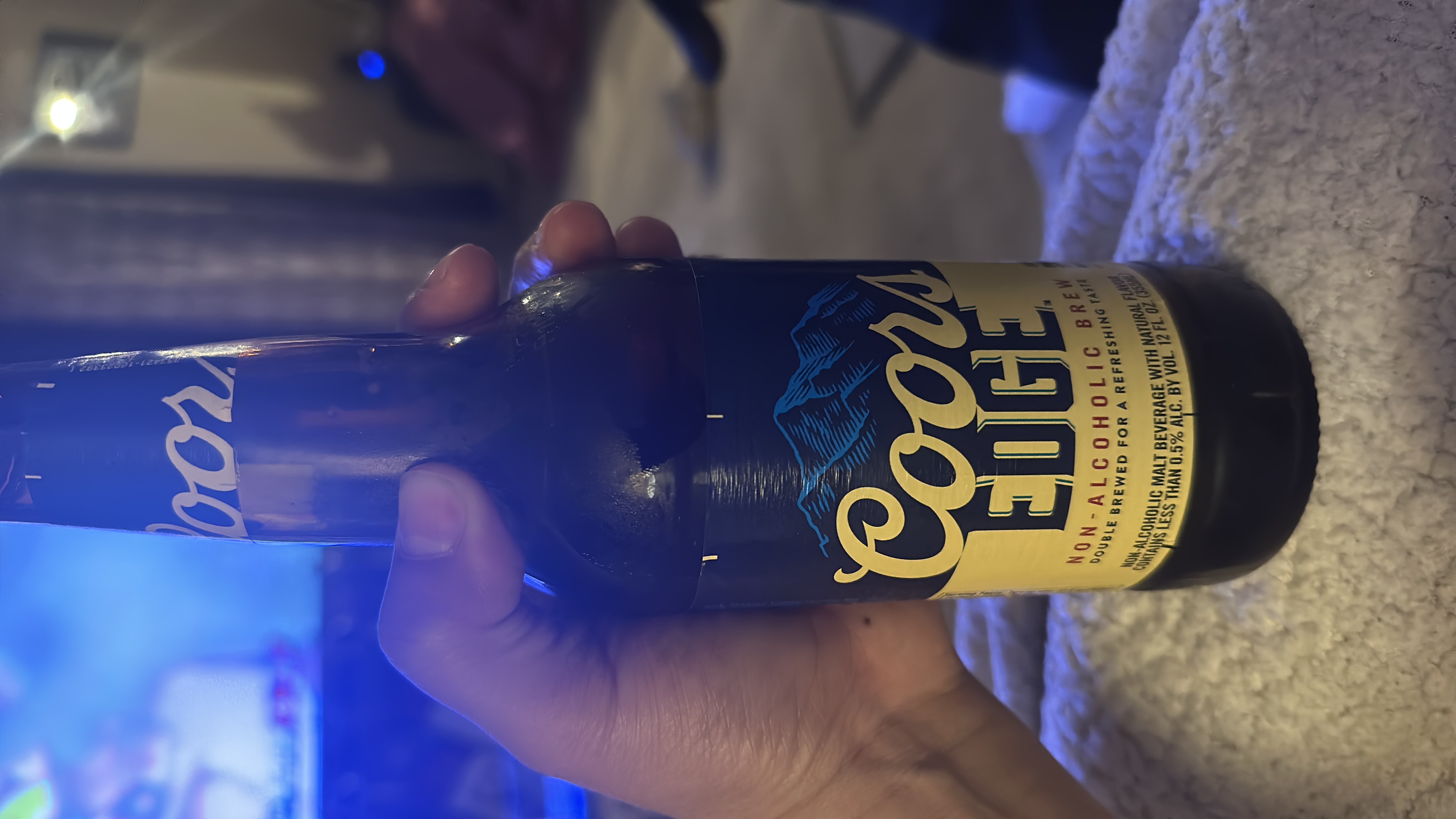 Coors Edge is a non-alcoholic brew with 45 calories per 12 fl oz, containing minimal protein and carbs, and no fats.