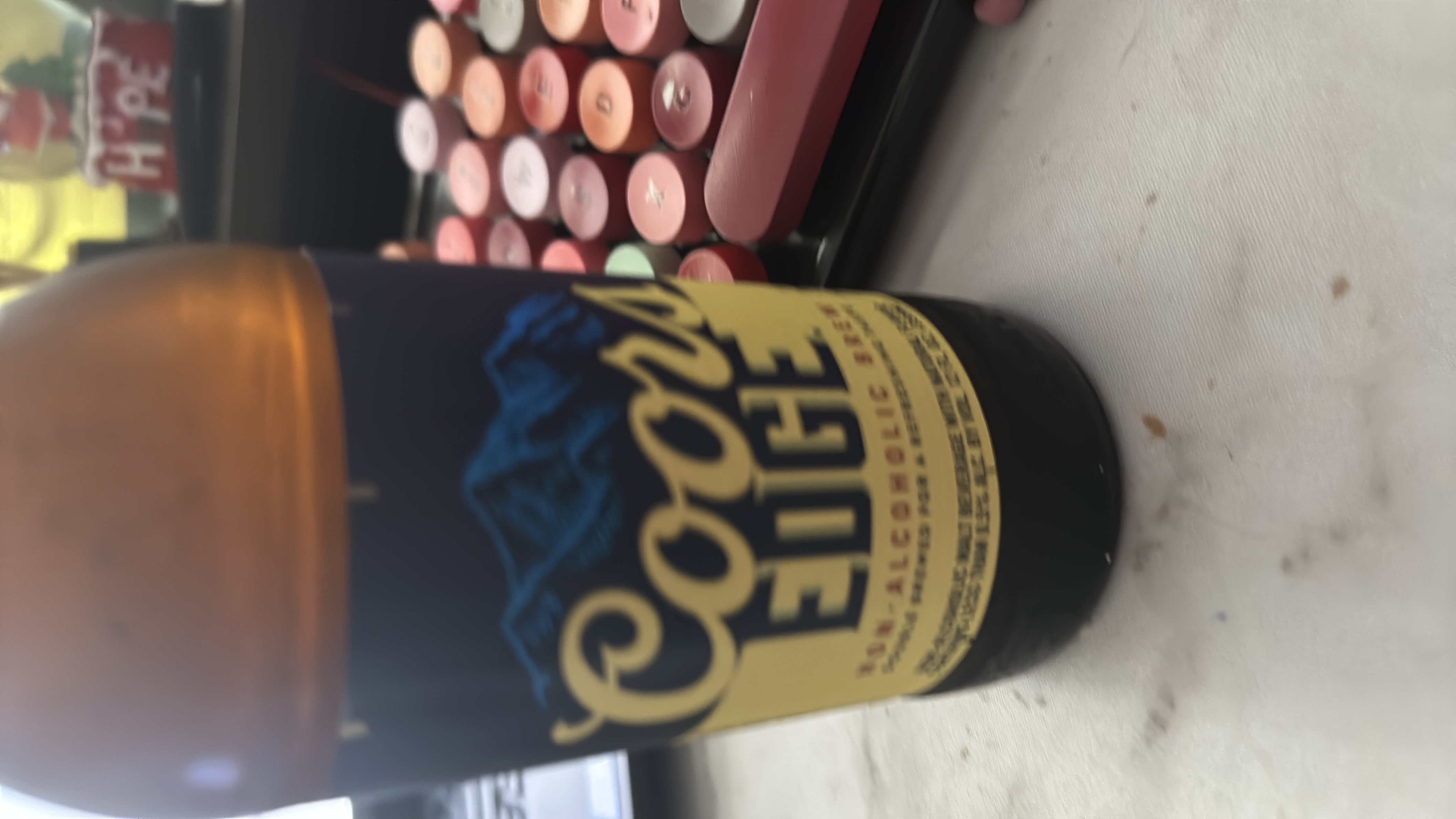 Coors Edge is a non-alcoholic beer with 41 calories per serving, low protein, and no fats, making it a light beverage option.