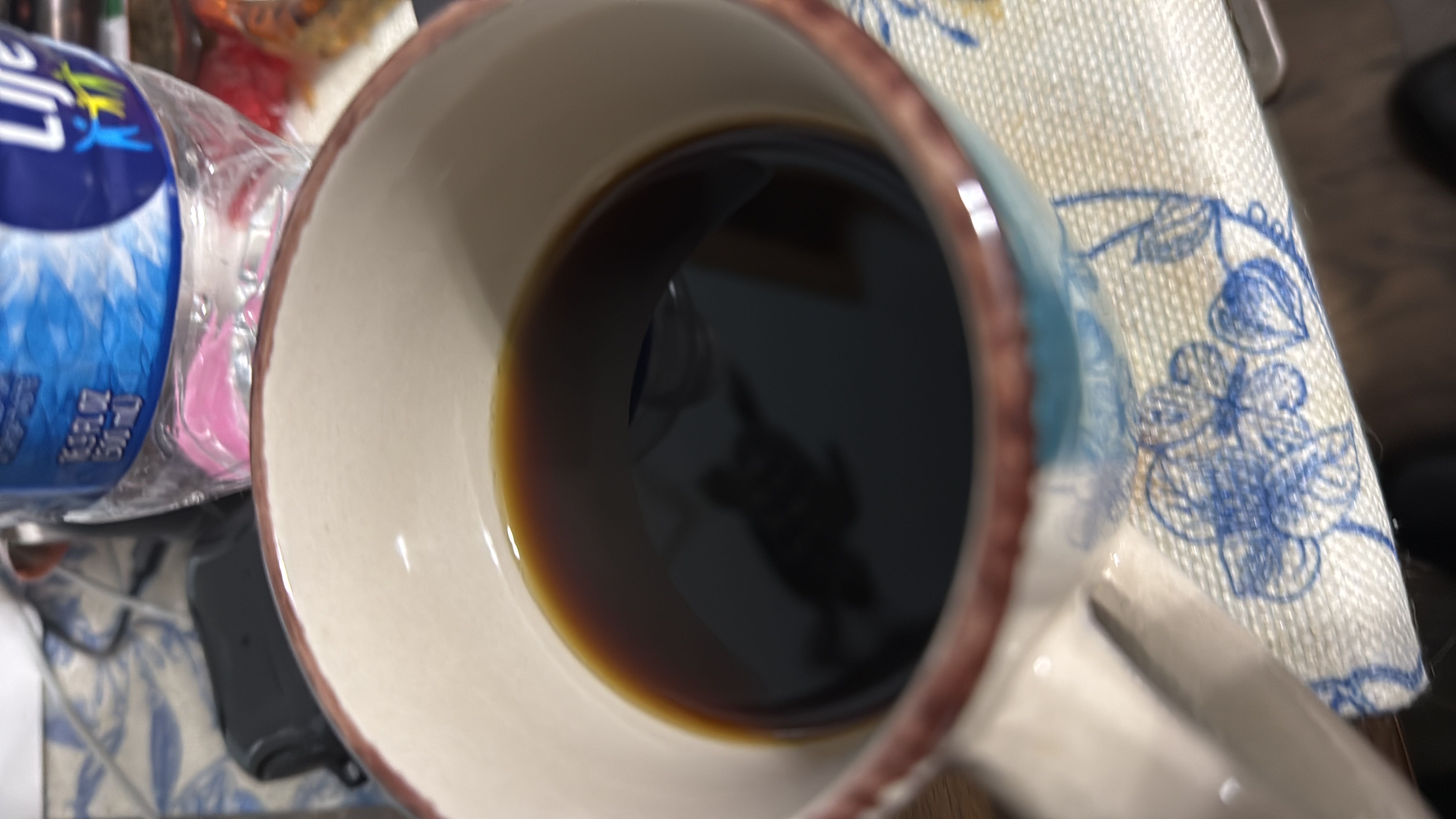 A cup of black coffee, low in calories and free of fats, carbs, and protein.
