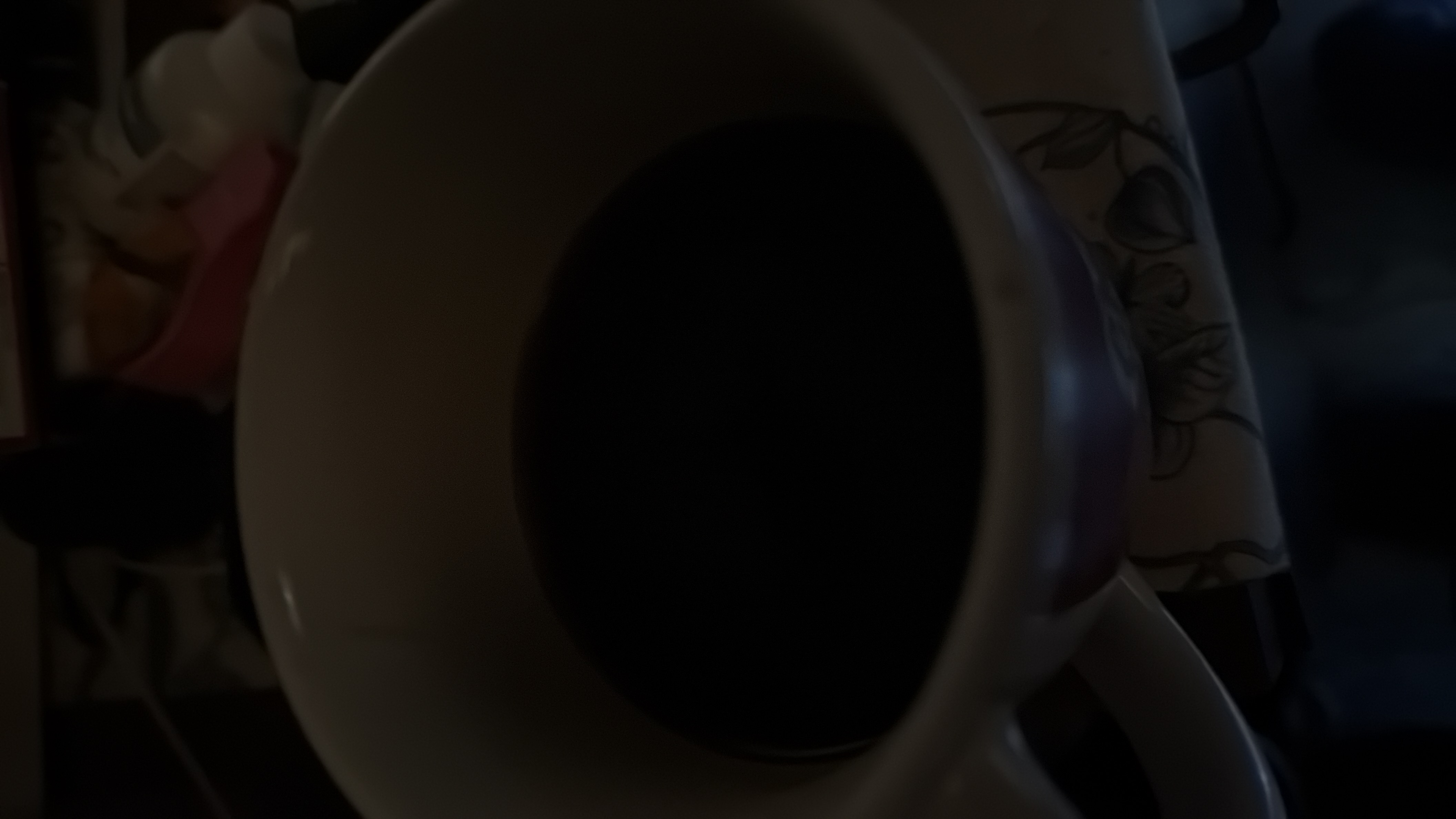 A cup of black coffee with minimal nutritional value.