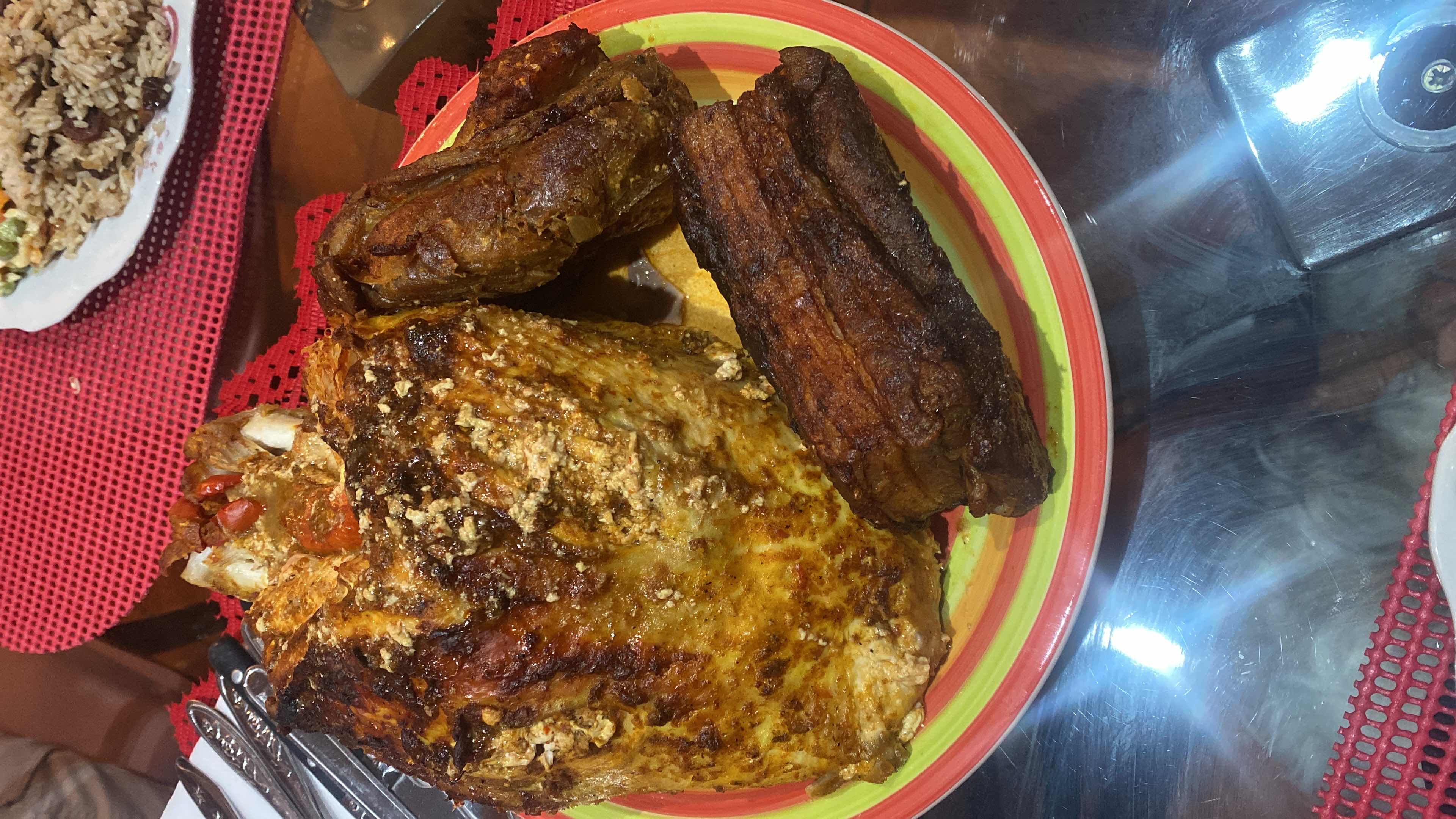 A roasted meat dish with a seasoned crust and moderate protein content.