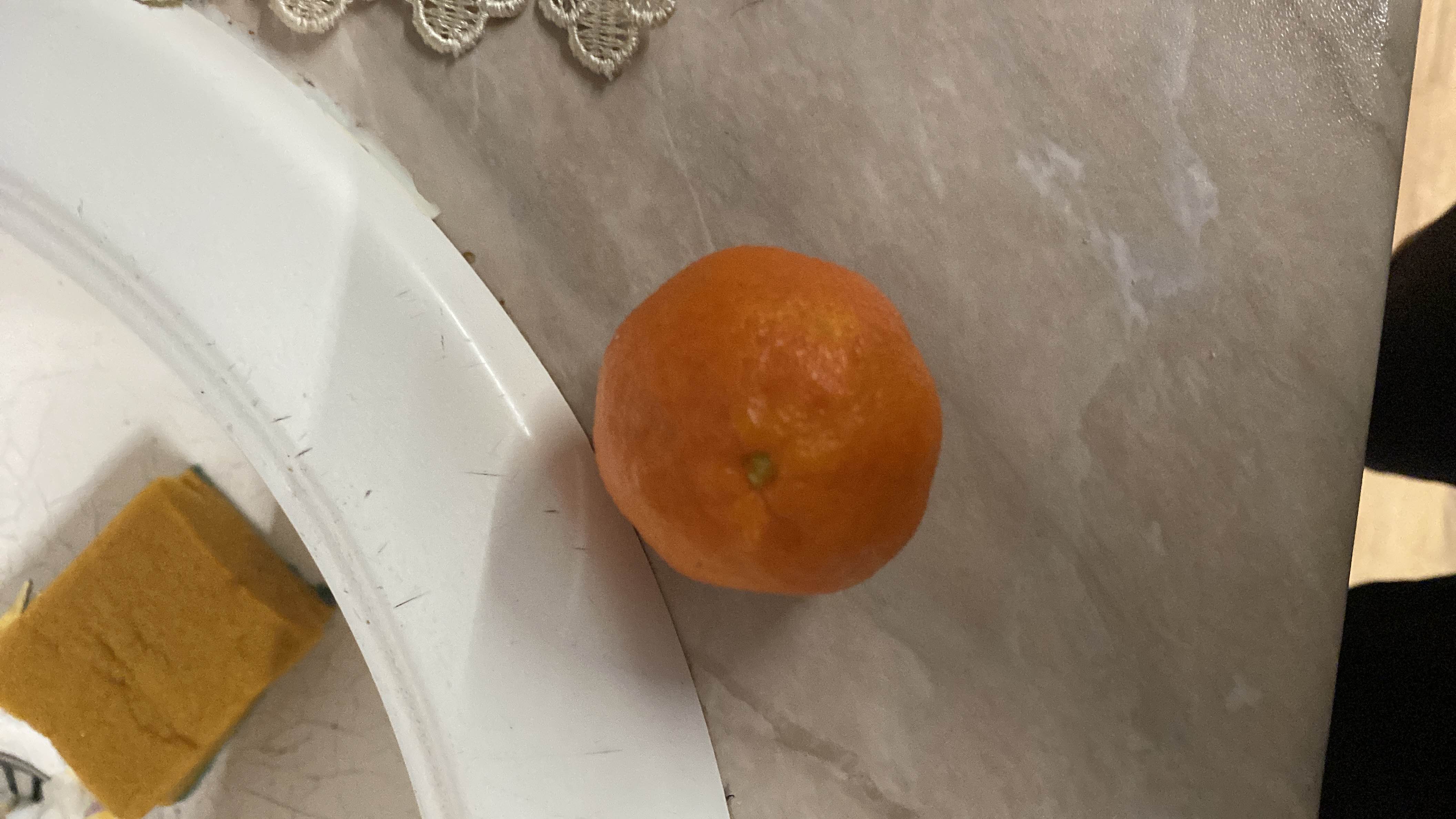 A small orange citrus fruit with a low calorie and high vitamin content.