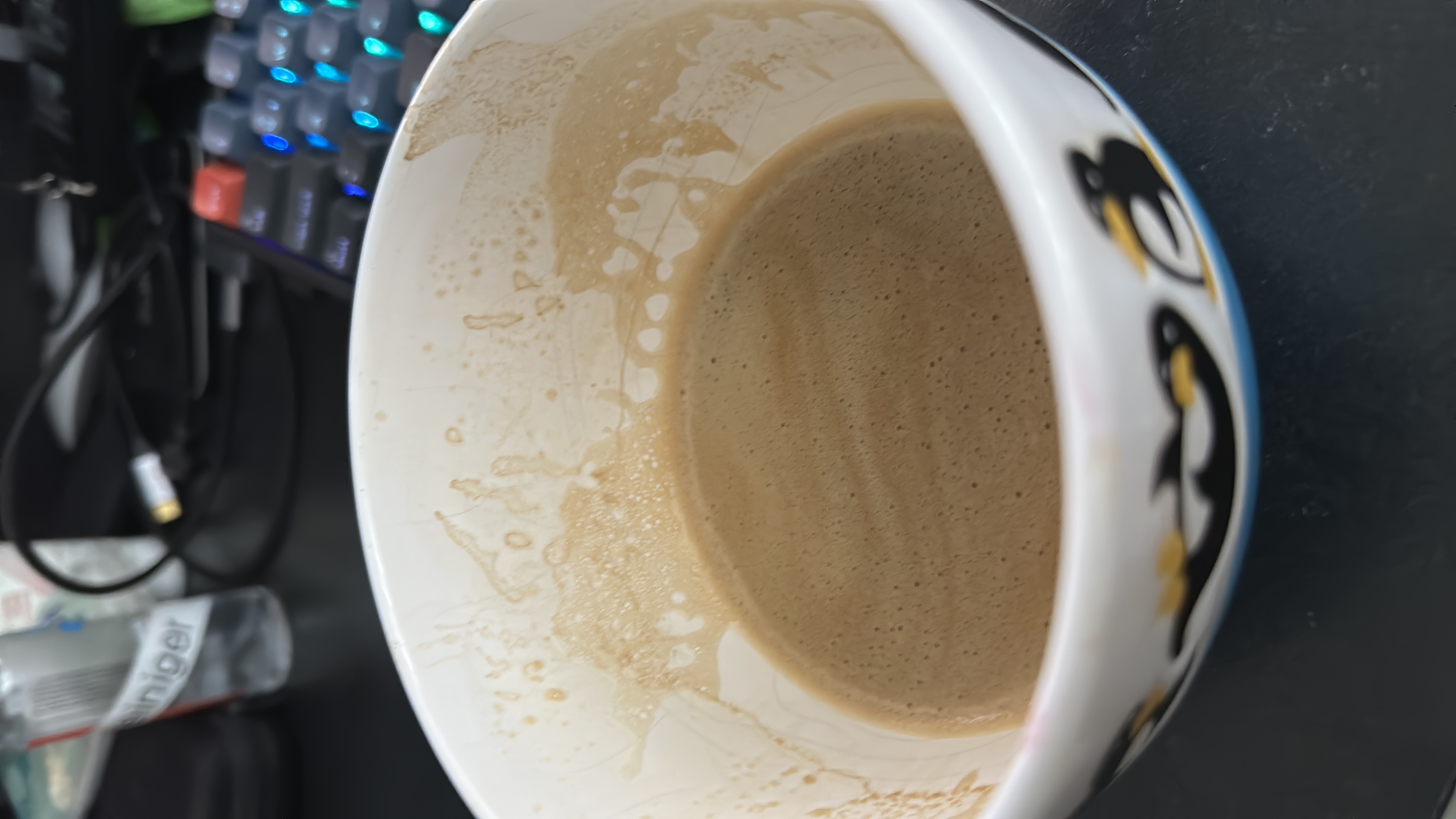 A cup of coffee with milk, providing a moderate amount of calories and a balanced nutritional profile.