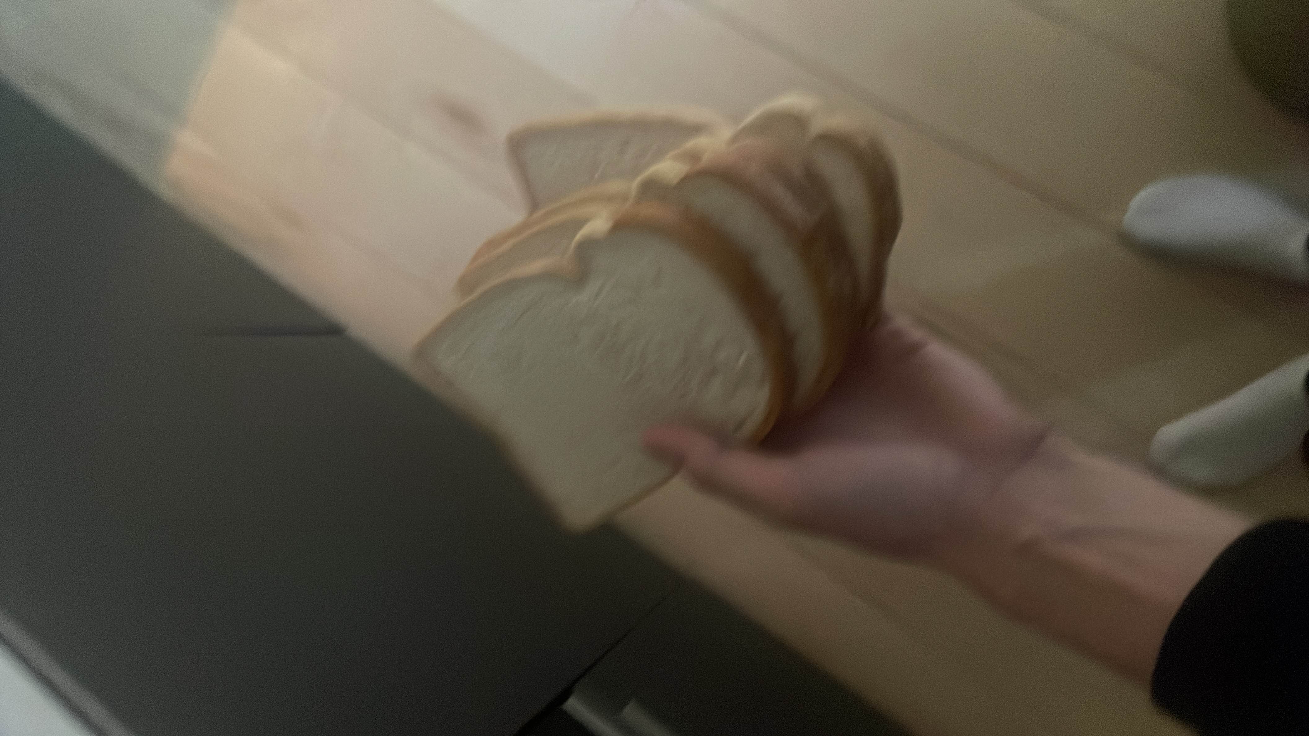 Eight slices of white bread with peanut butter, providing high carbohydrates, moderate protein, and increased fat content.