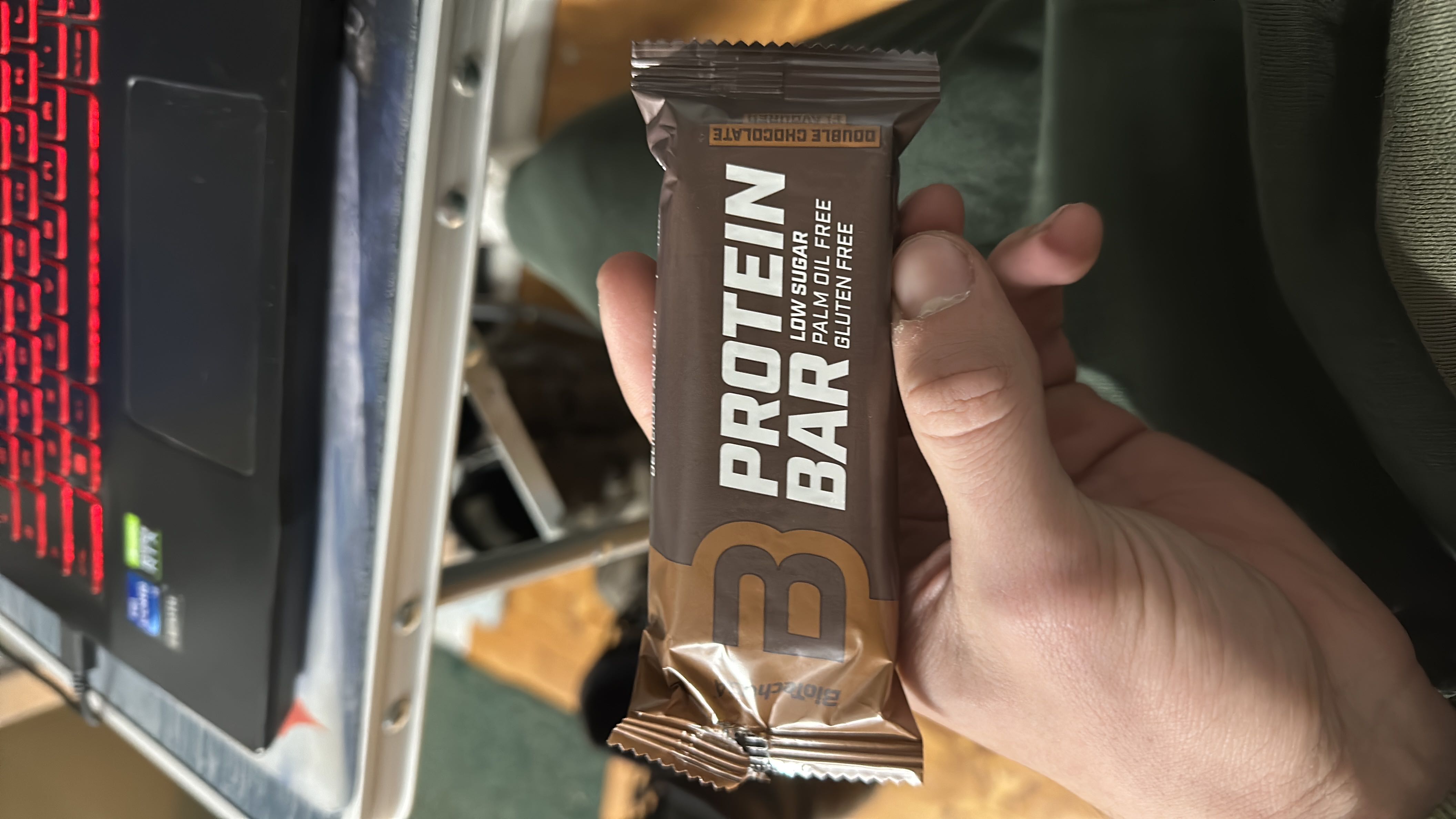 A low-sugar, palm oil-free, gluten-free protein bar with a double chocolate flavor, providing a balanced mix of protein, carbs, and fats.