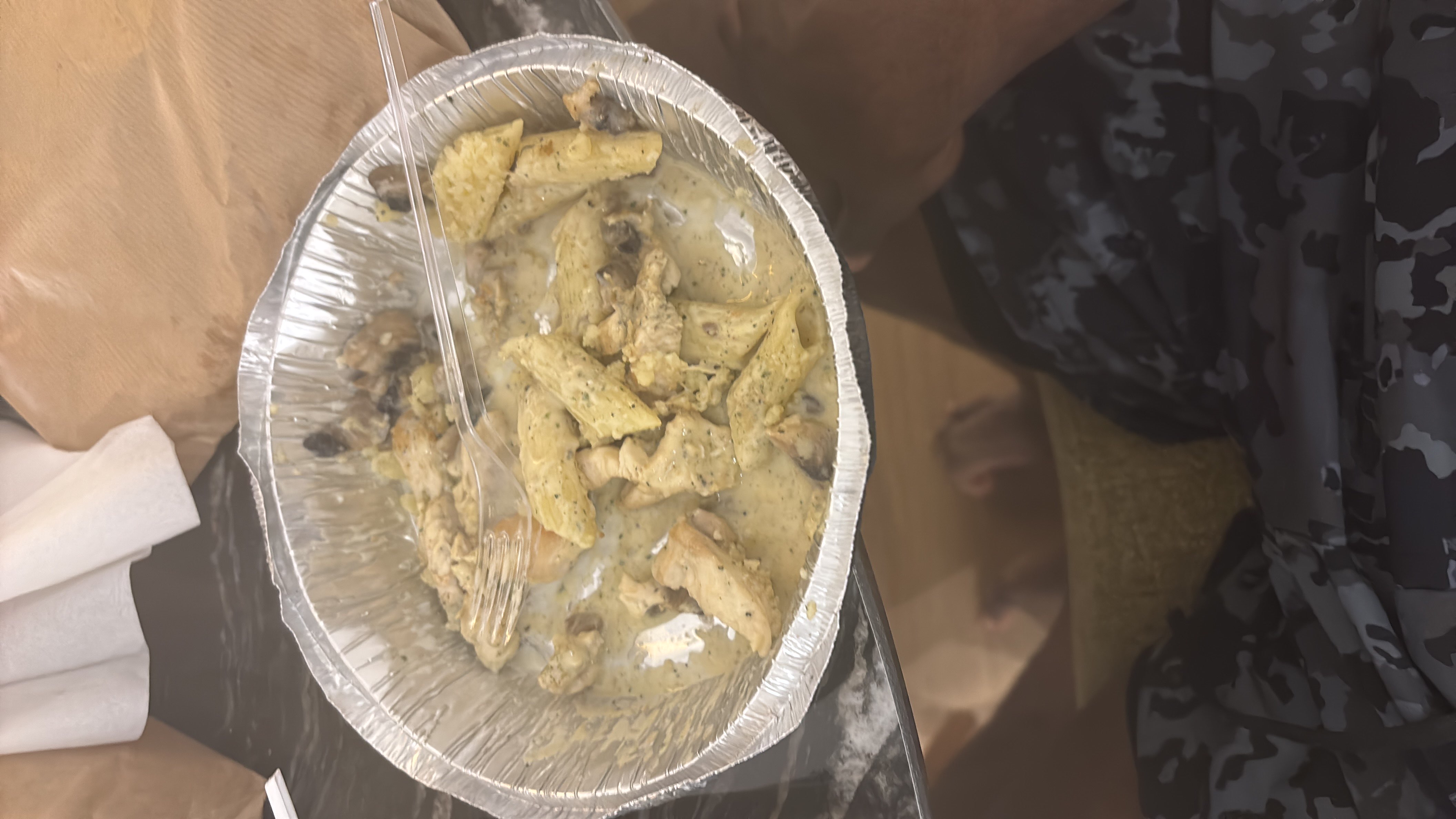 A creamy chicken pasta dish with a rich sauce, containing chicken, pasta, and a creamy base.