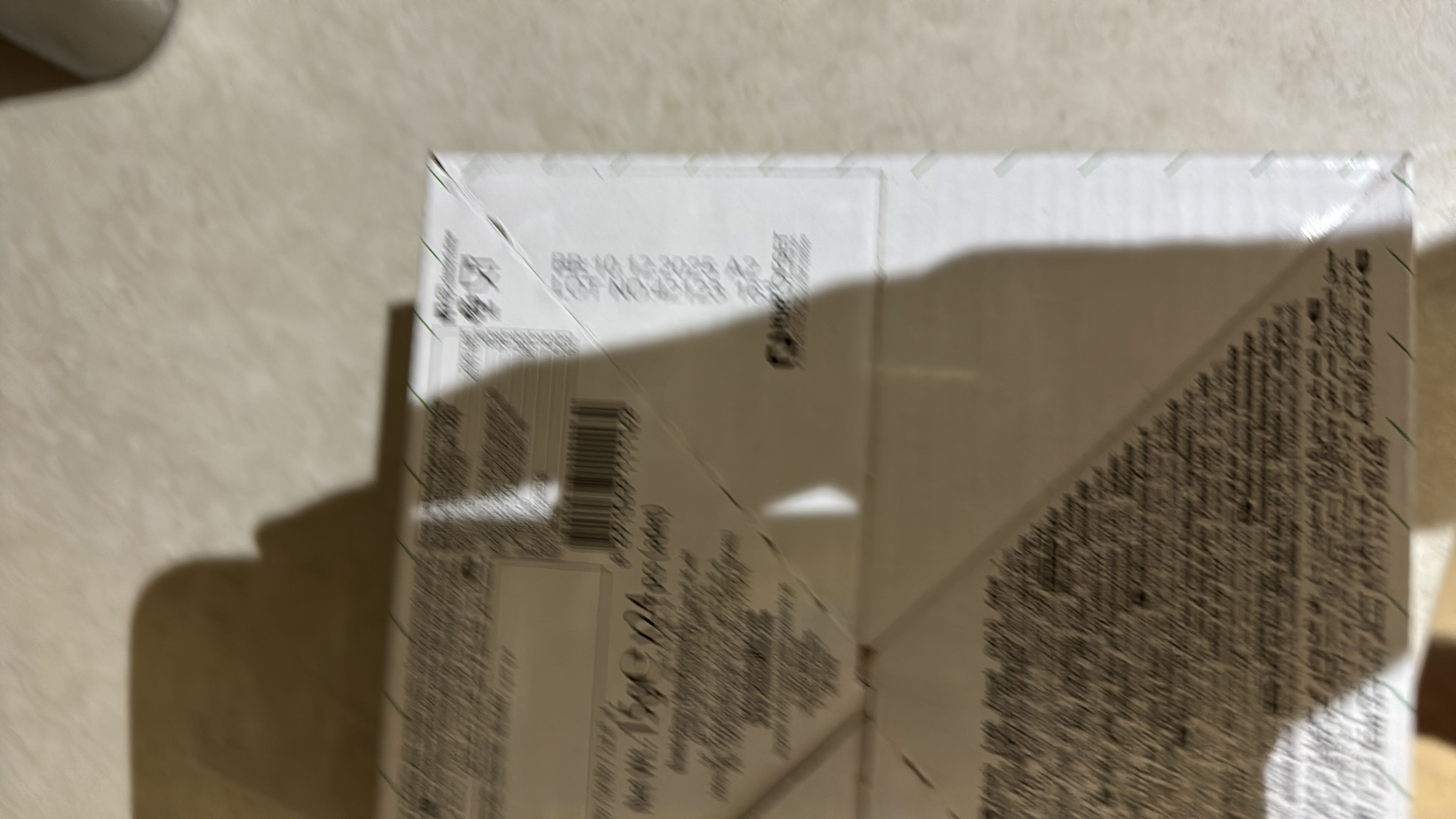 The image is unclear, and the nutritional information cannot be extracted.