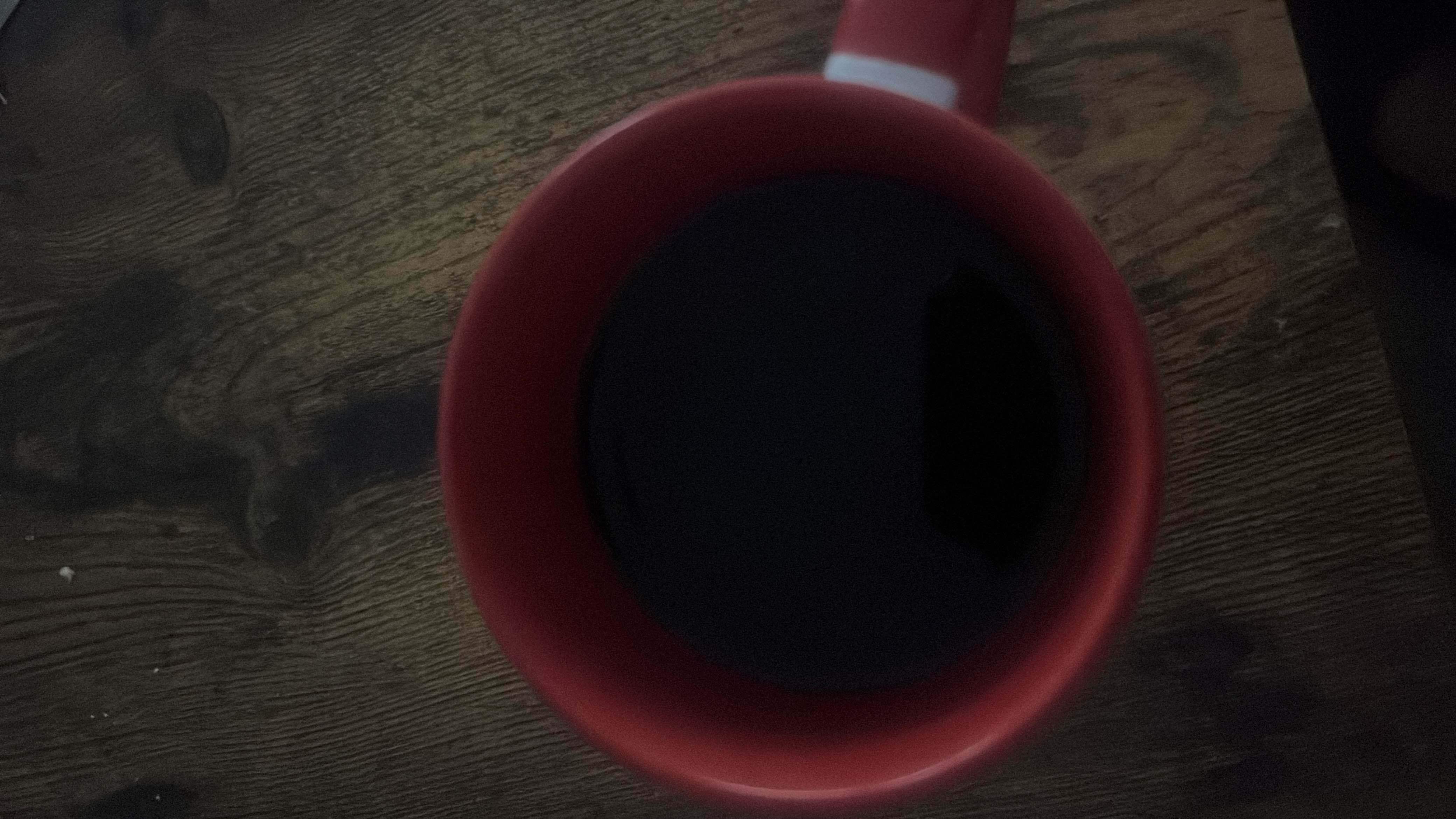 A cup of black coffee, low in calories and free of fats, carbs, and protein.