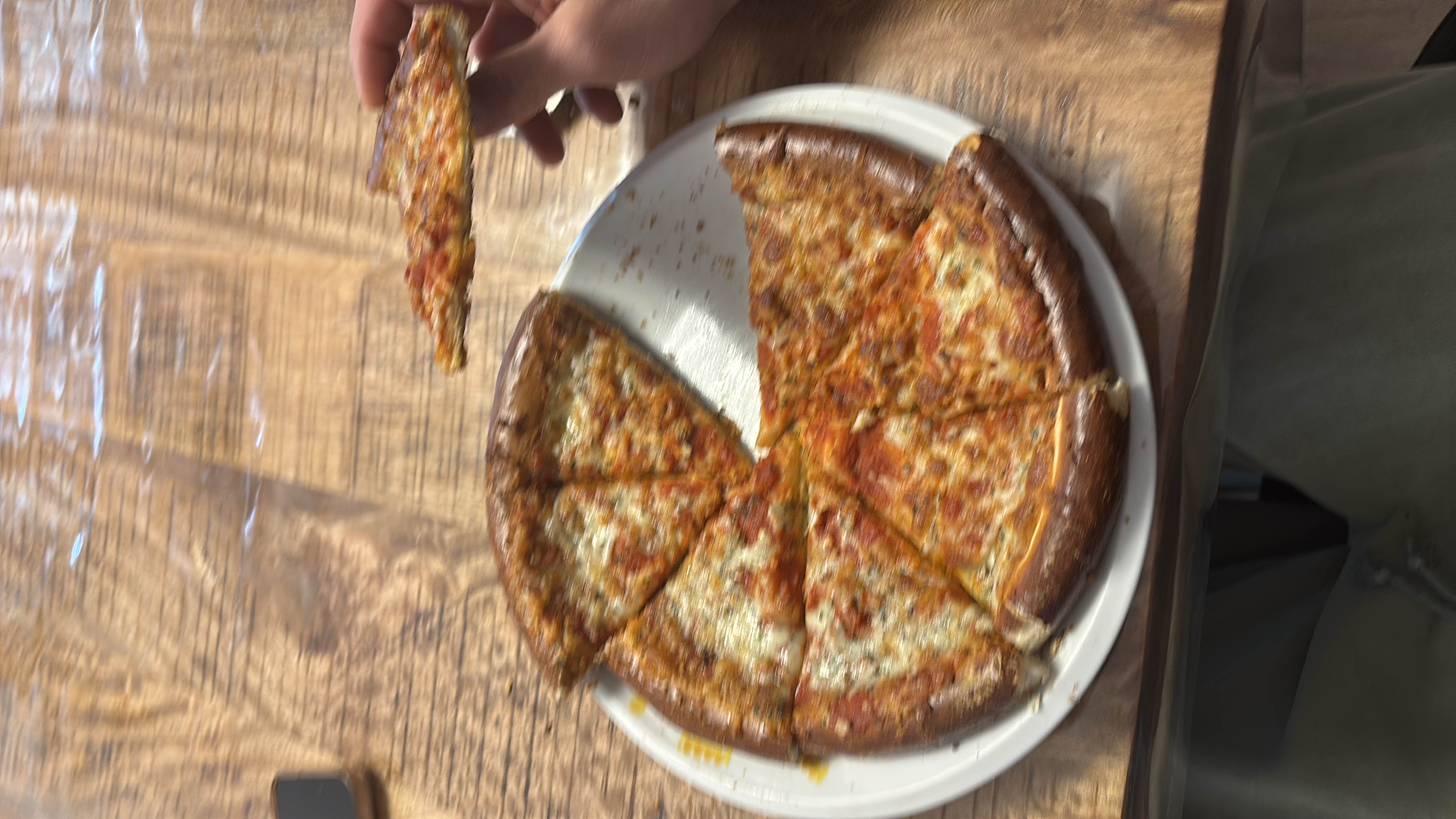 A cheese pizza with a crispy crust, topped with tomato sauce and melted cheese.