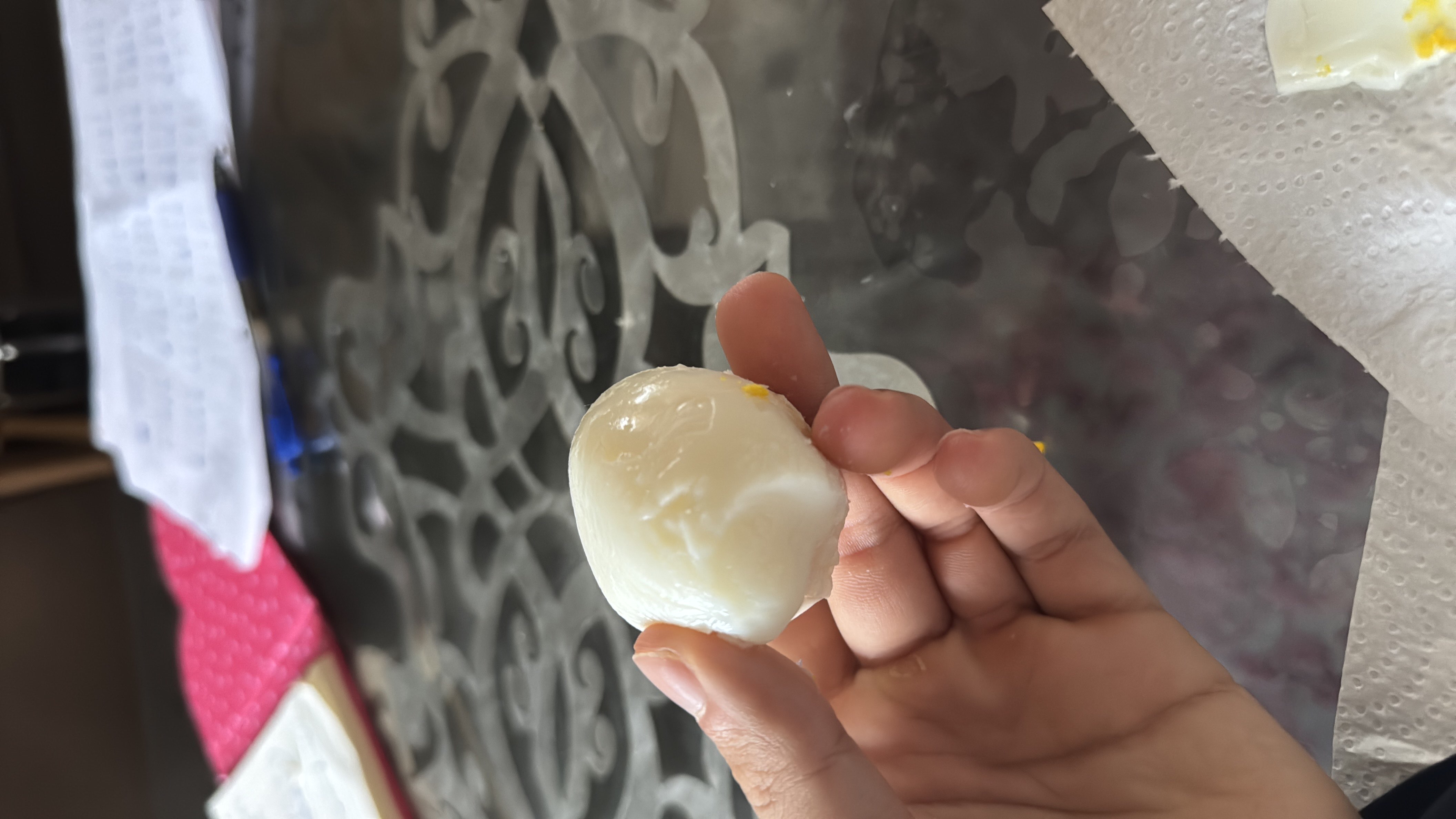 A boiled egg, a nutritious food item high in protein and healthy fats, is depicted.