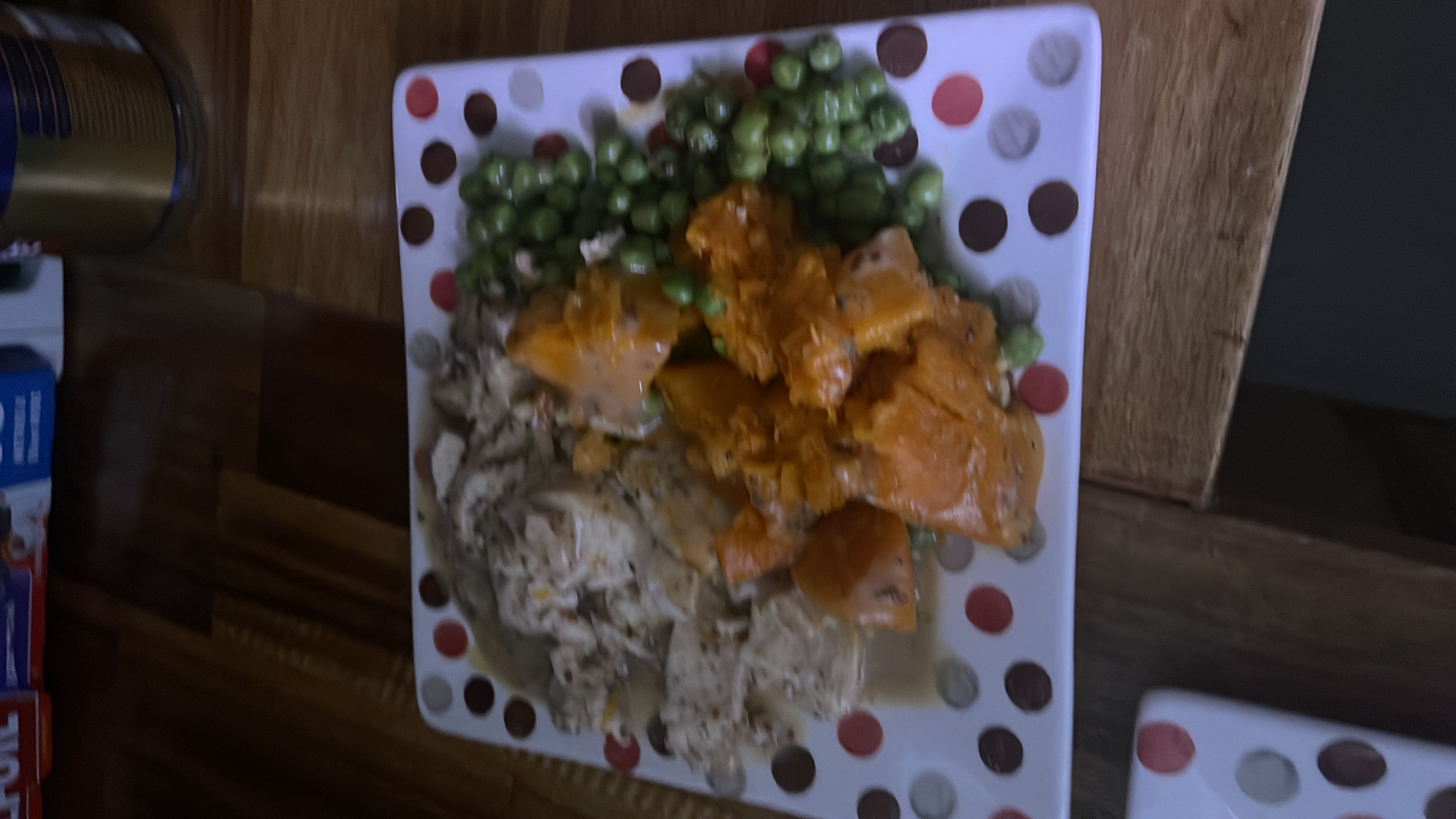 A balanced meal consisting of chicken, sweet potatoes, and peas, providing a good mix of protein, carbs, and fats.