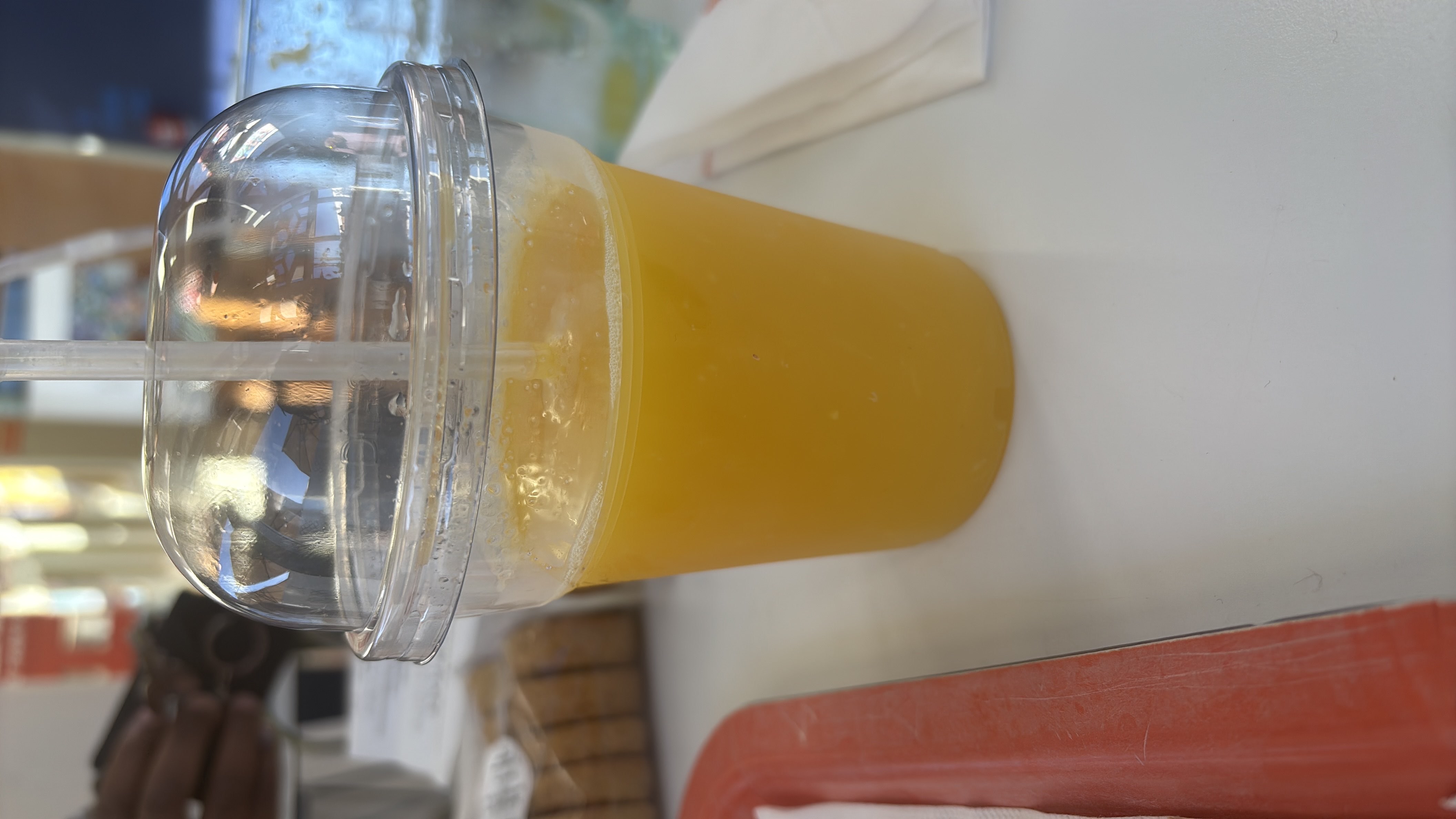 A refreshing glass of orange juice, rich in natural sugars and vitamin C, with minimal fats and moderate calories.