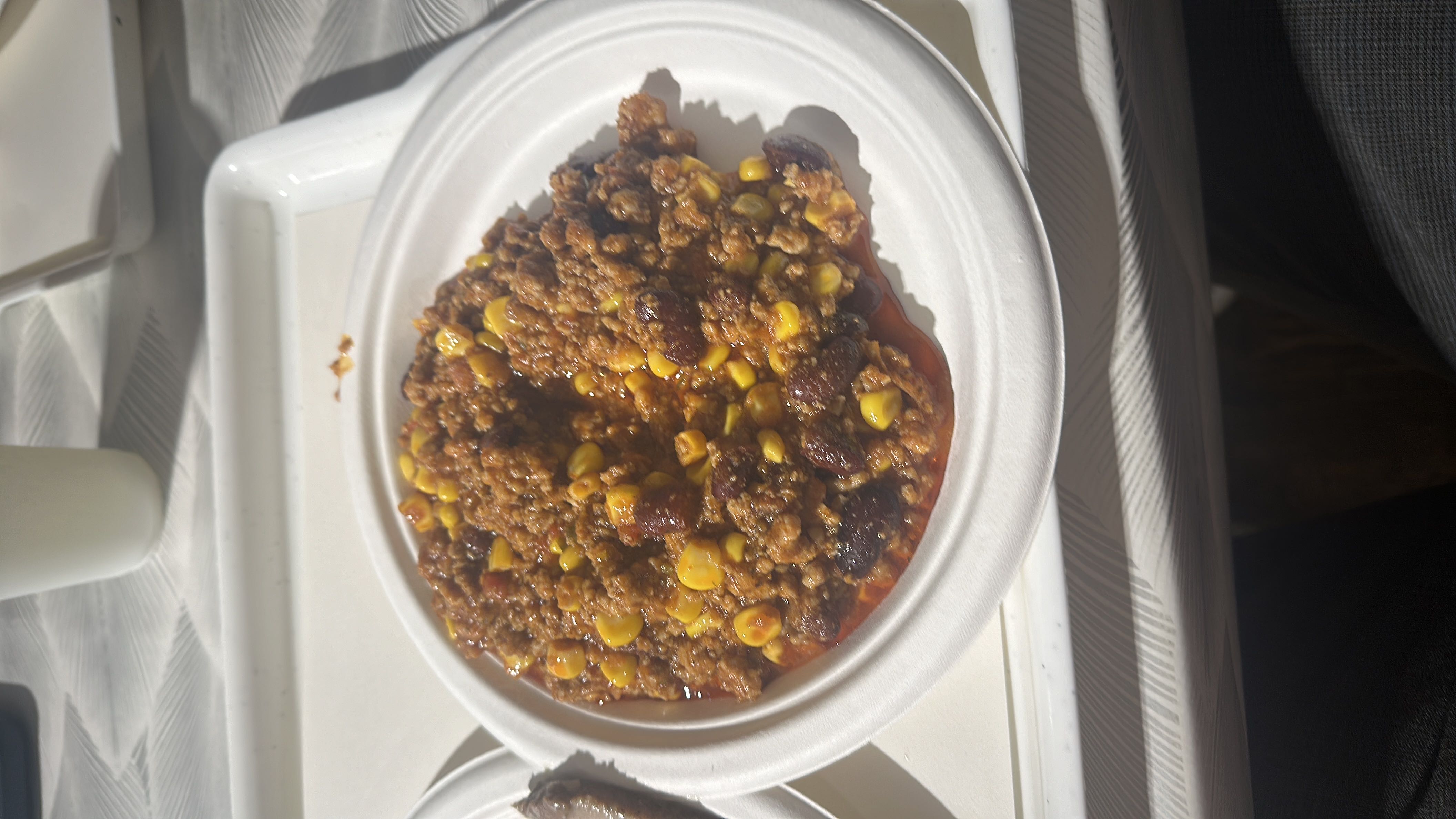 A hearty dish consisting of ground beef, corn, and beans, providing a balanced mix of protein, carbs, and fats.