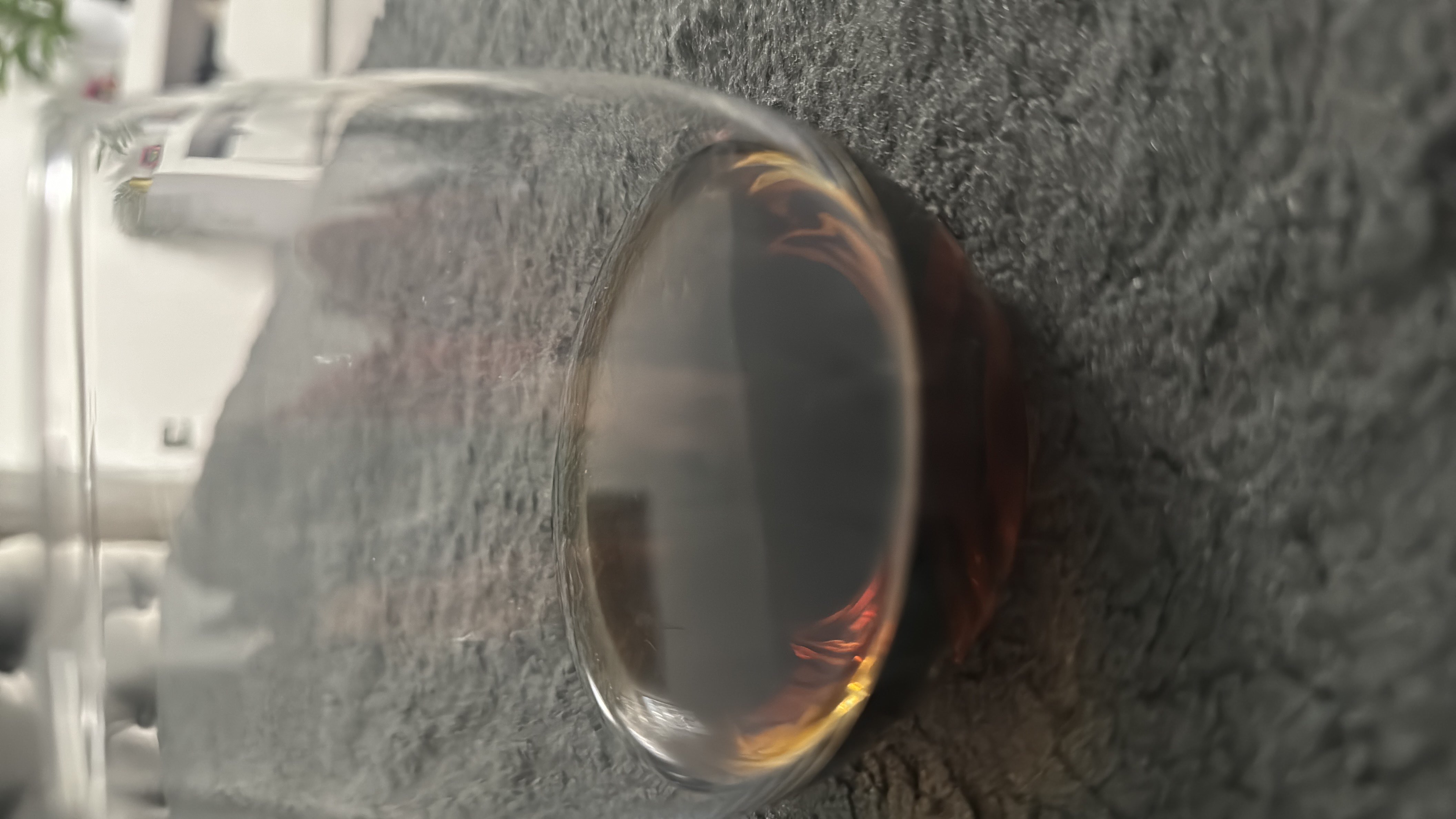 A glass of black coffee, which is low in calories and contains no macronutrients.