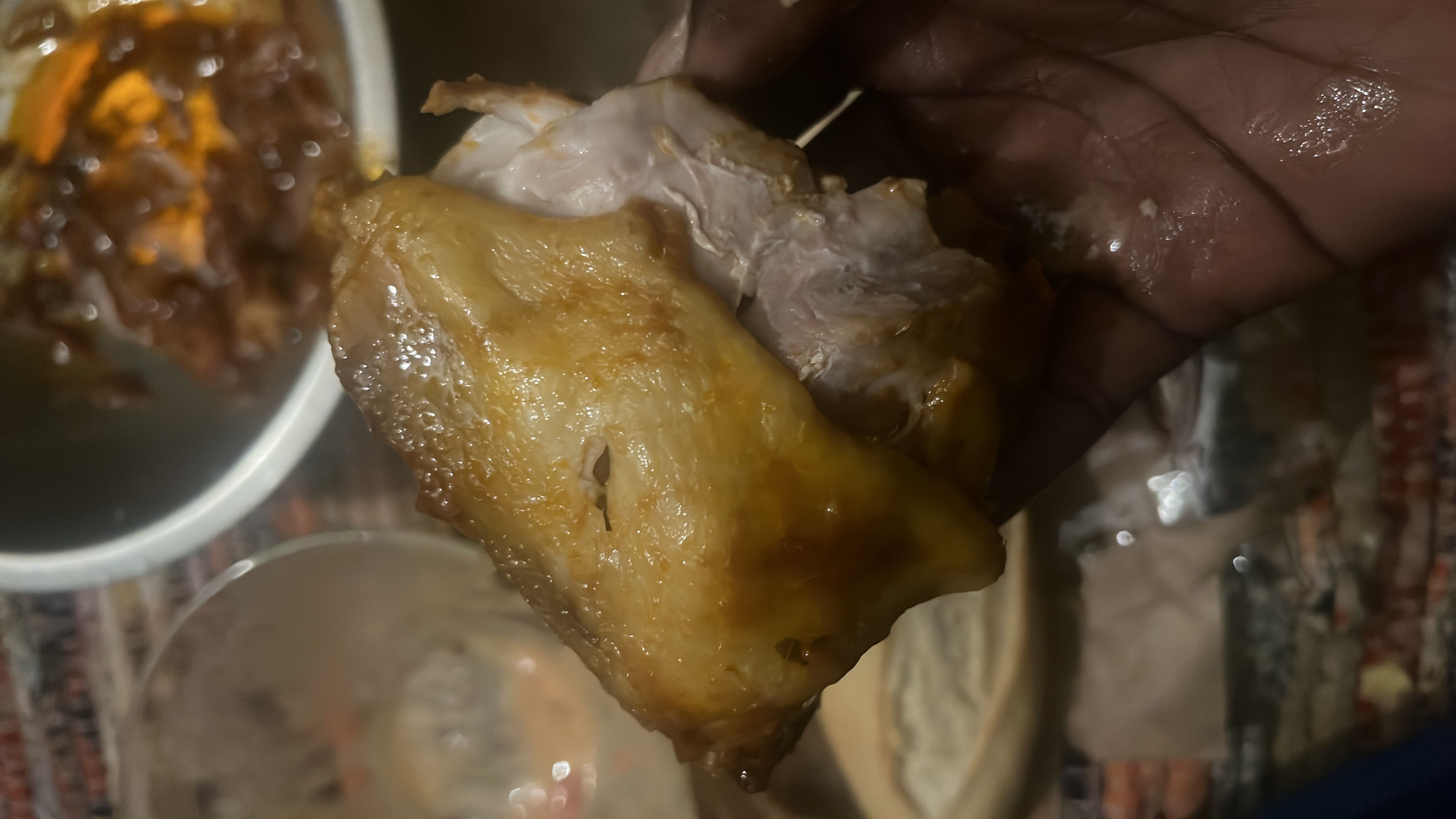 A cooked chicken thigh, rich in protein and fats, with no carbohydrates.