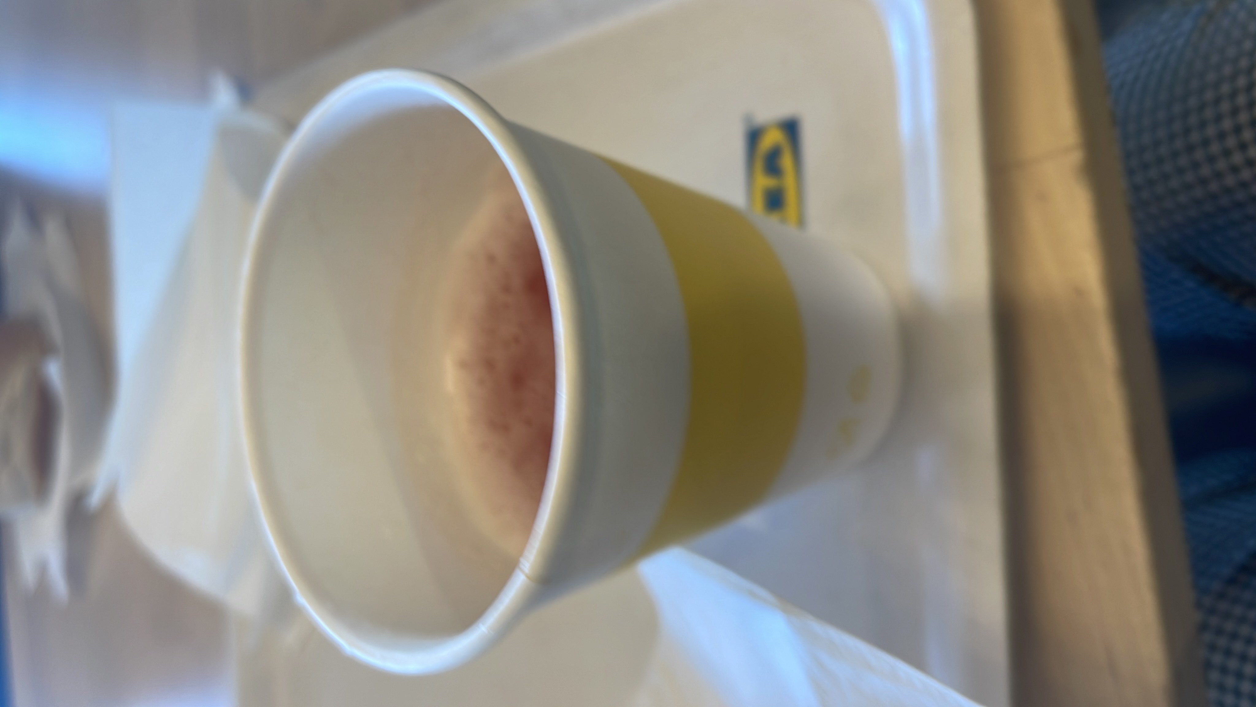 A cup of fruit juice, likely low in calories and fats, with moderate carbohydrates.