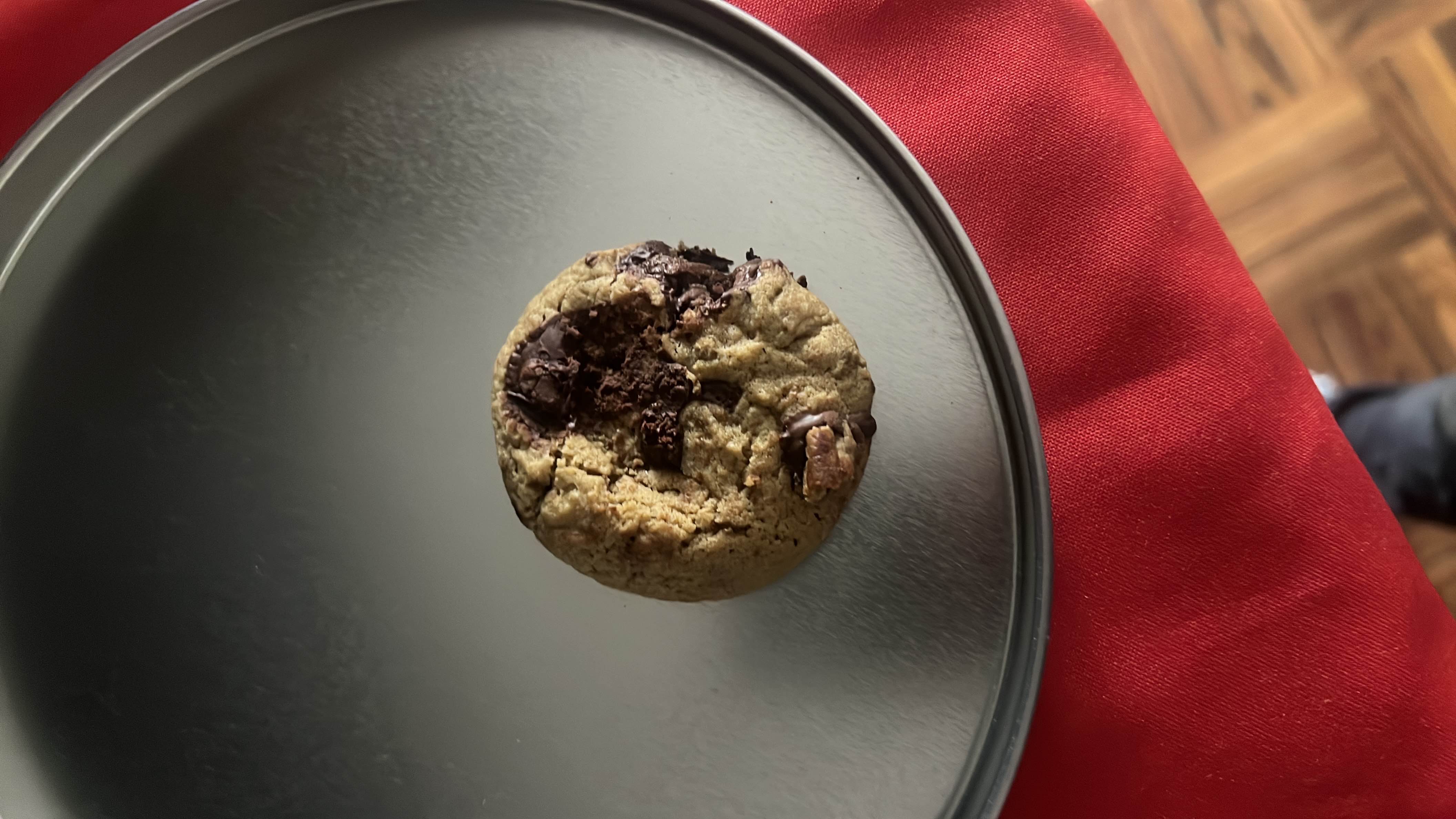 Three chocolate chip cookies with a balance of fats, carbs, and protein, offering low nutritional value.