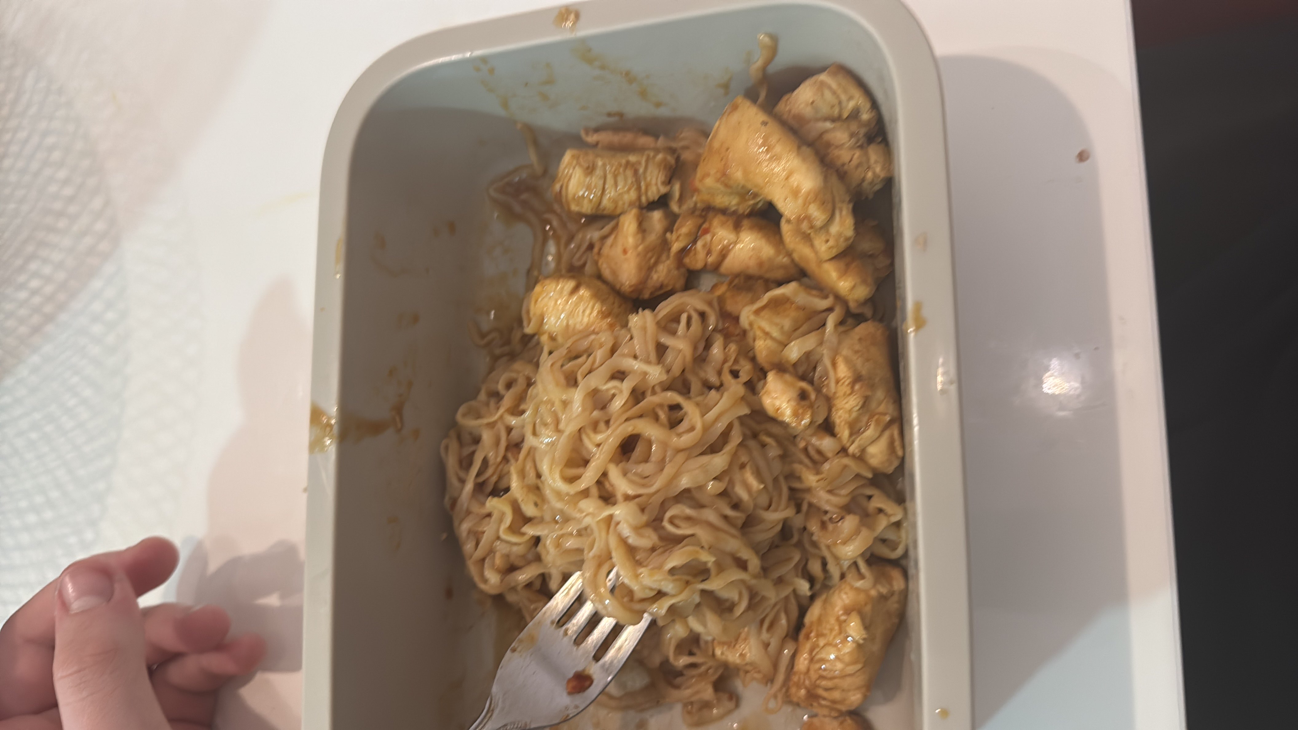 A meal consisting of stir-fried chicken and noodles, providing a balanced mix of protein and carbohydrates.