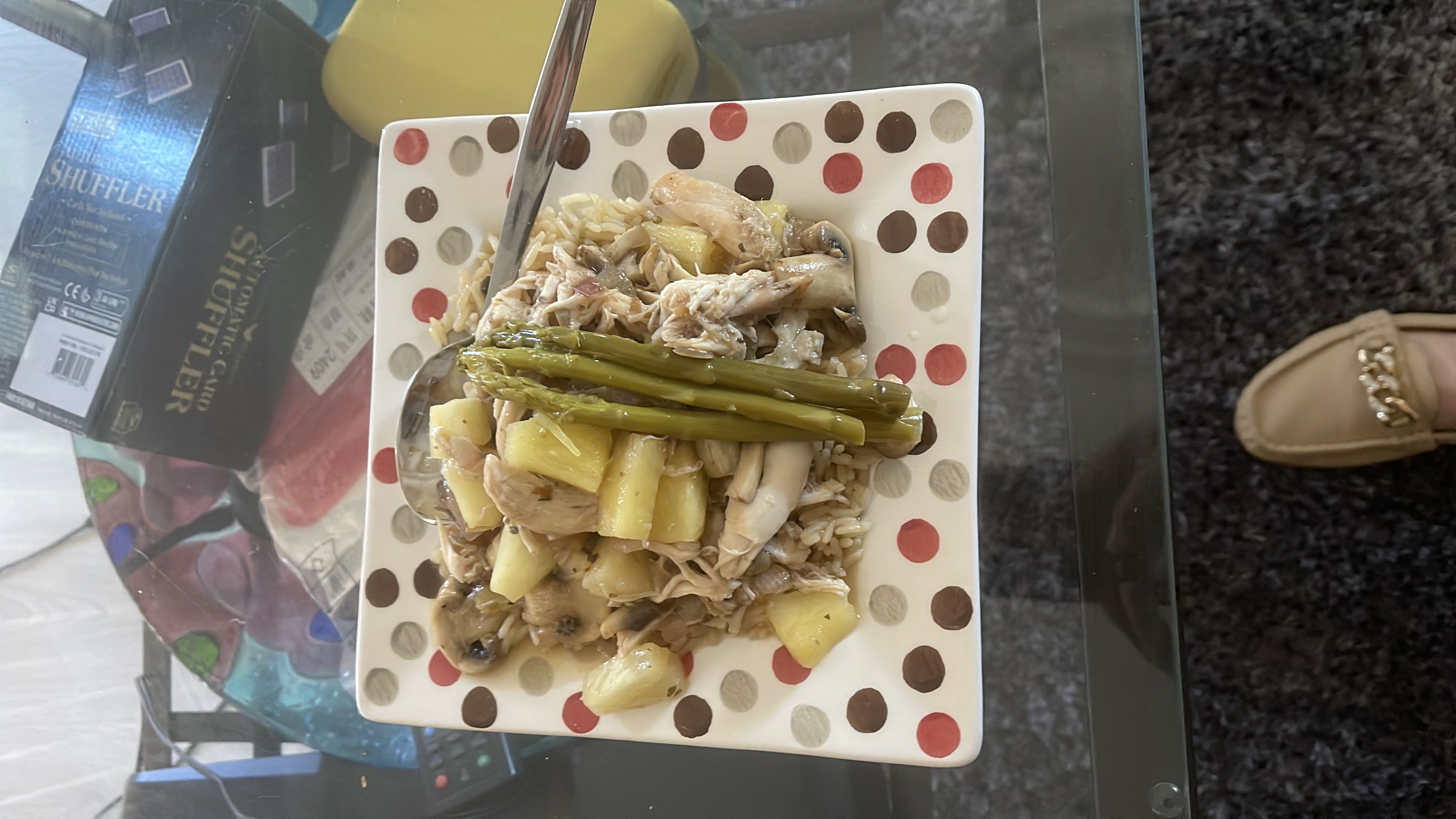 A balanced dish containing chicken, asparagus, pineapple, mushrooms, and rice, providing a mix of protein, carbs, and fats.