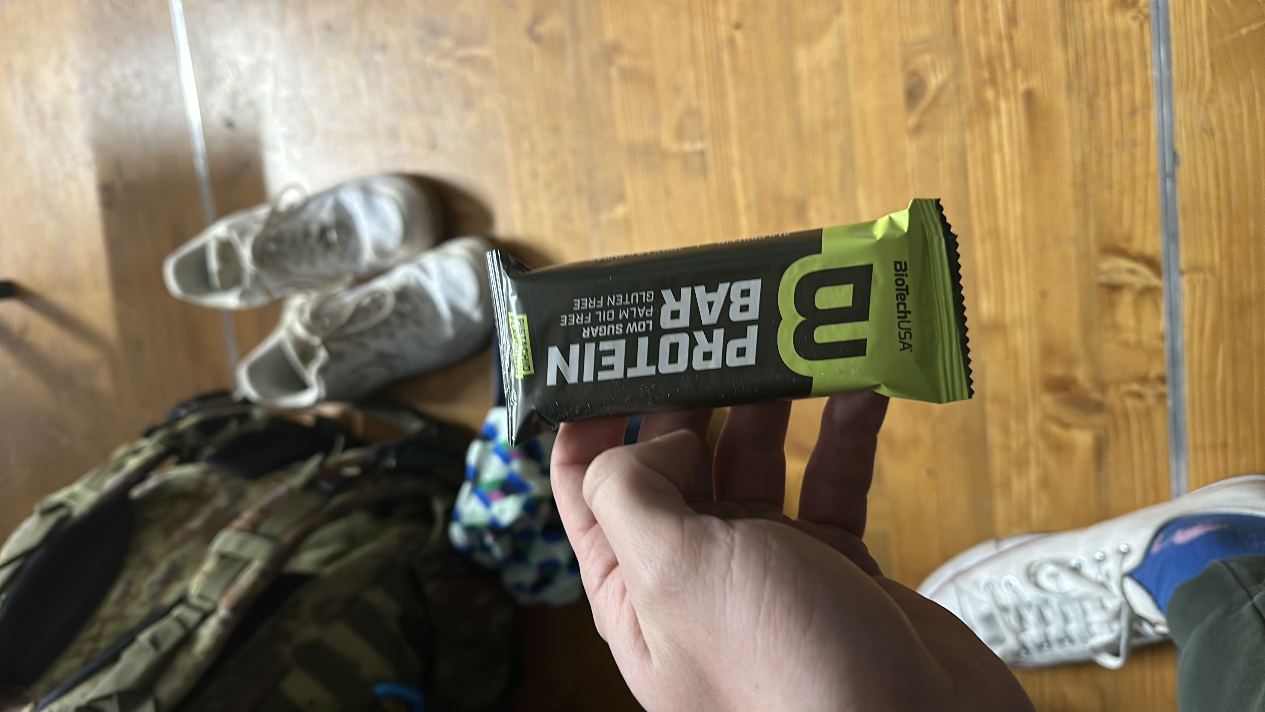 A protein bar with low sugar, palm oil-free, and gluten-free, designed for a healthy snack option.