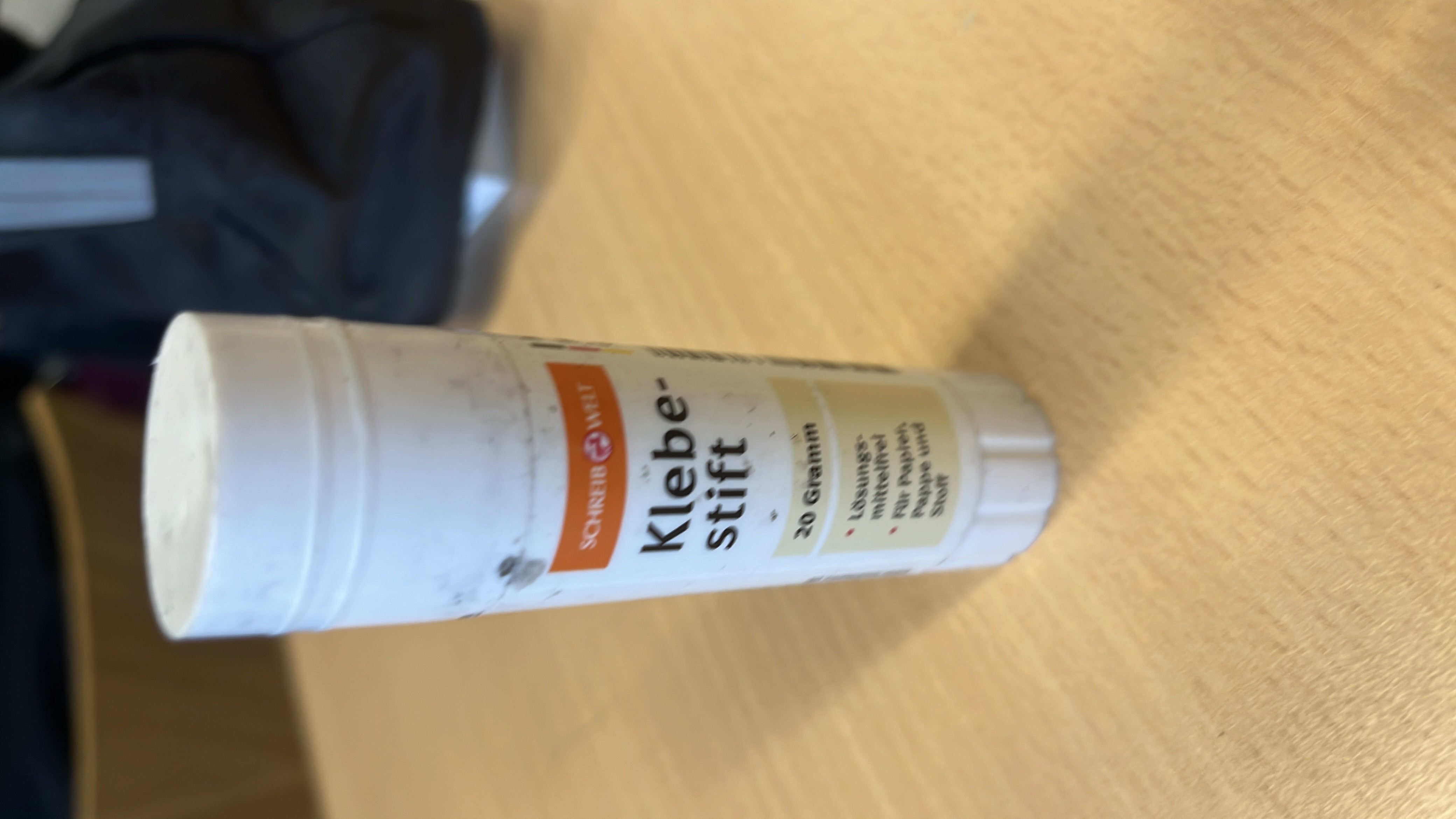 The image depicts a glue stick, which is not a food item and contains no nutritional value.