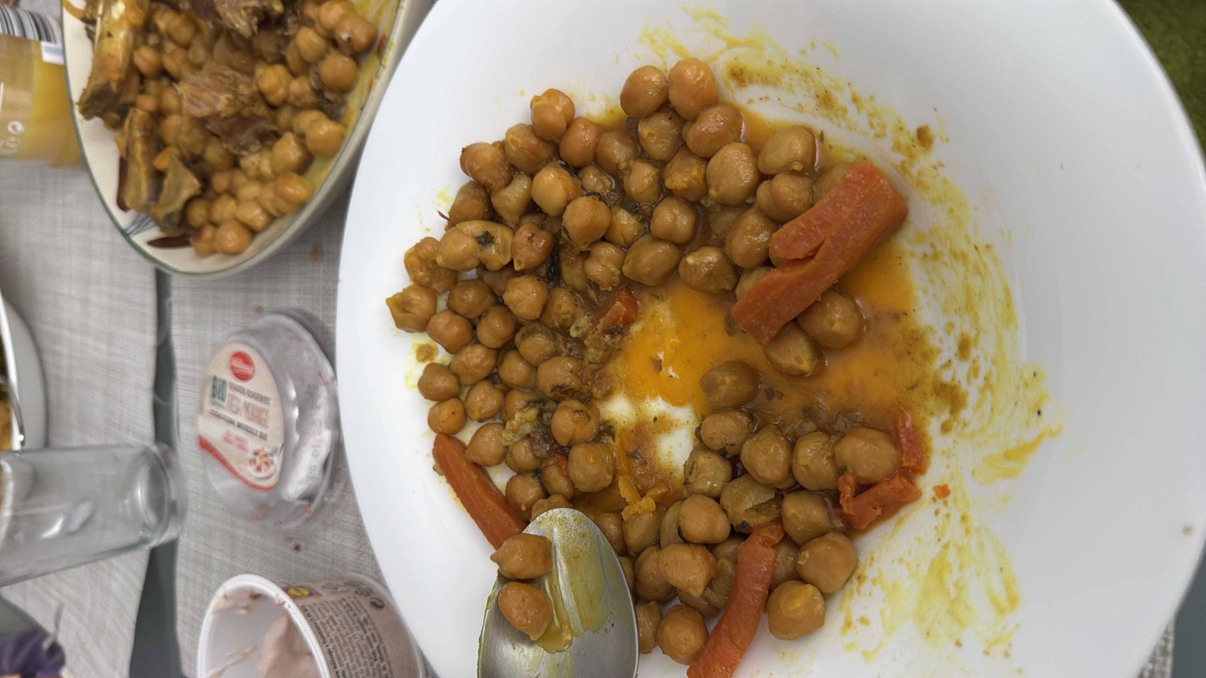 A dish consisting of chickpeas and carrots cooked with spices, providing a balanced nutritional profile.