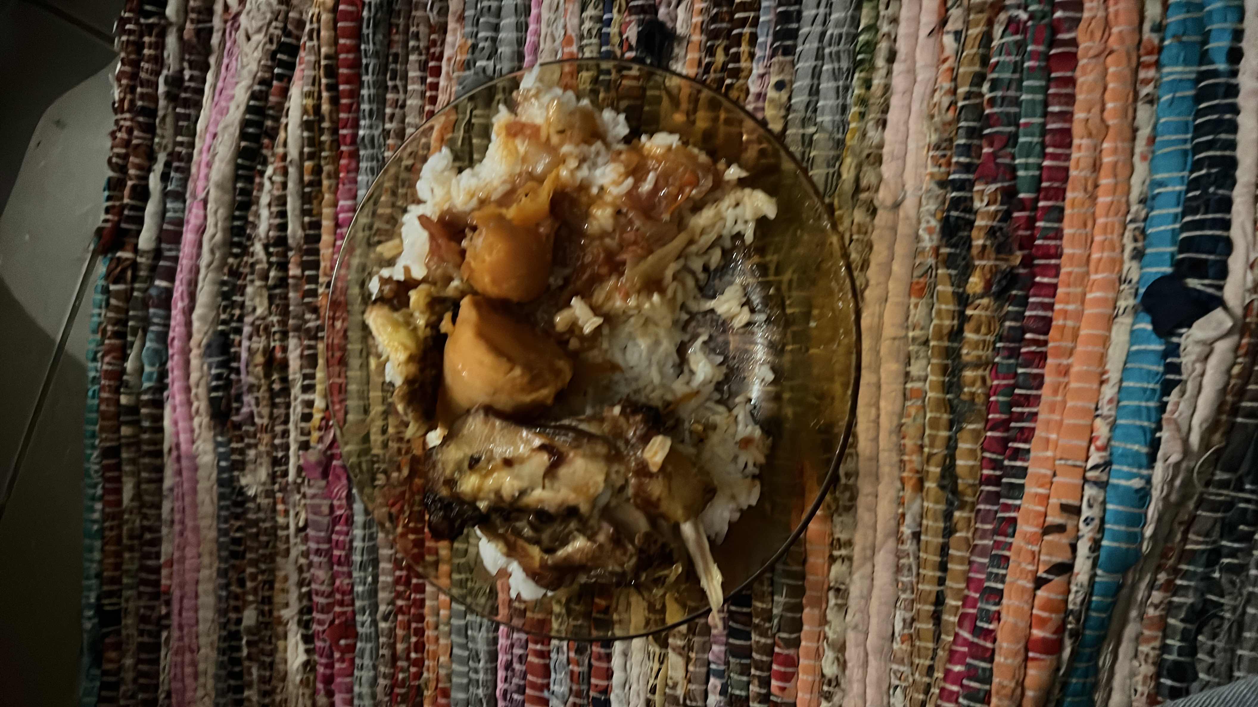 A dish consisting of roasted chicken, rice, sweet potatoes, and onions, providing a balanced mix of protein, carbs, and fats.