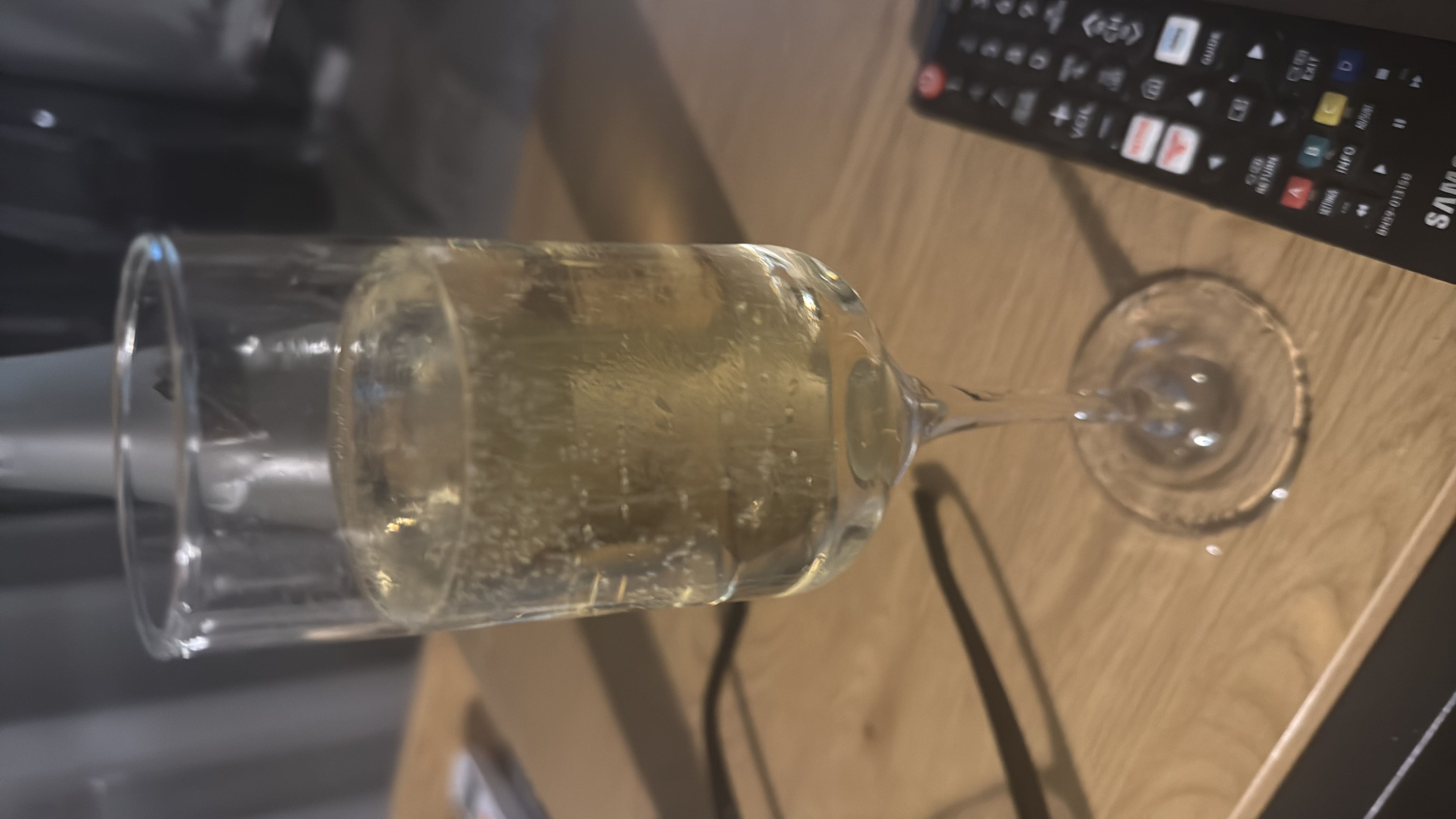 A glass of sparkling wine, low in protein and fats, with minimal carbohydrates.