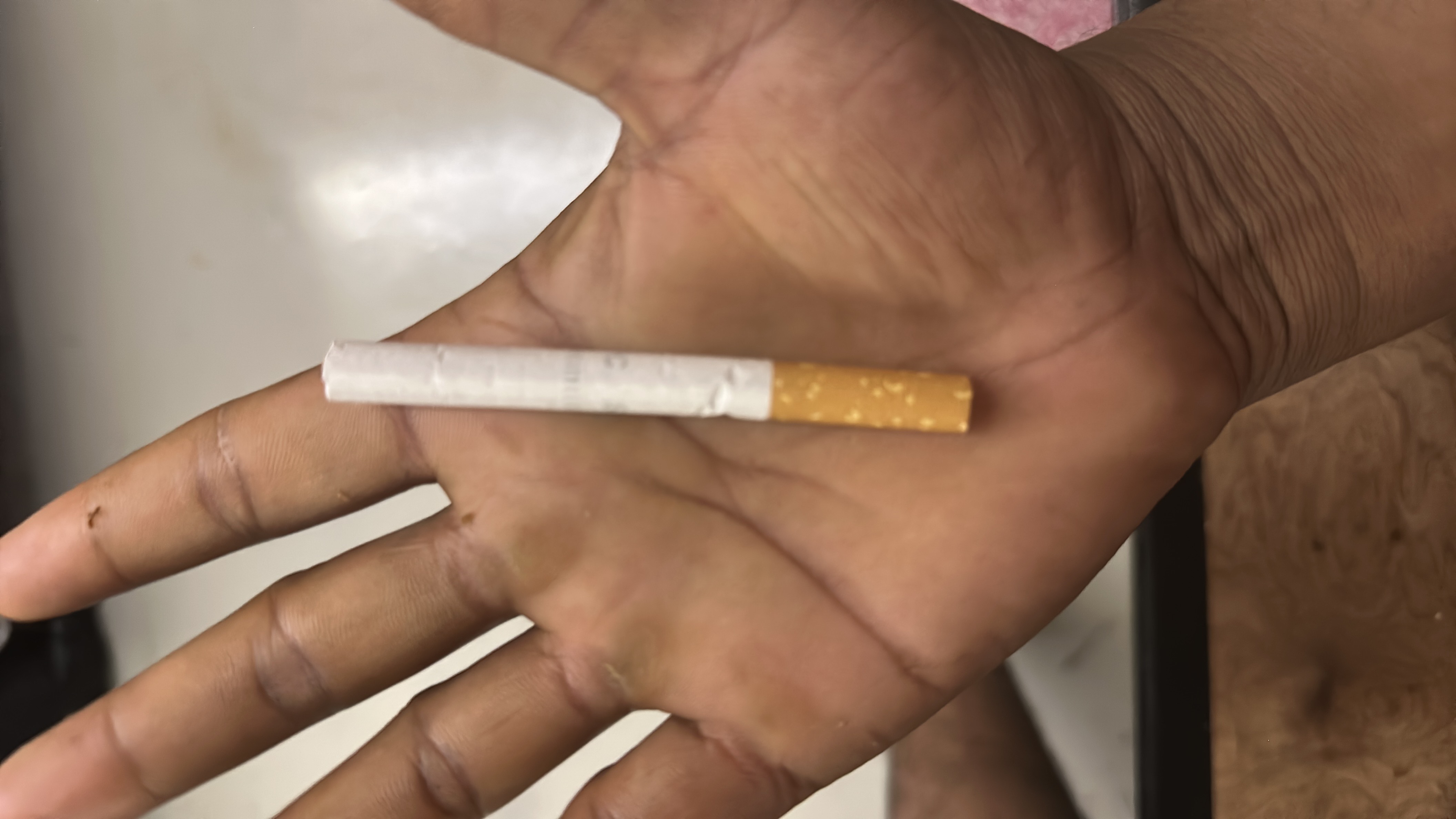 The image shows a cigarette, which has no nutritional value and is harmful to health.