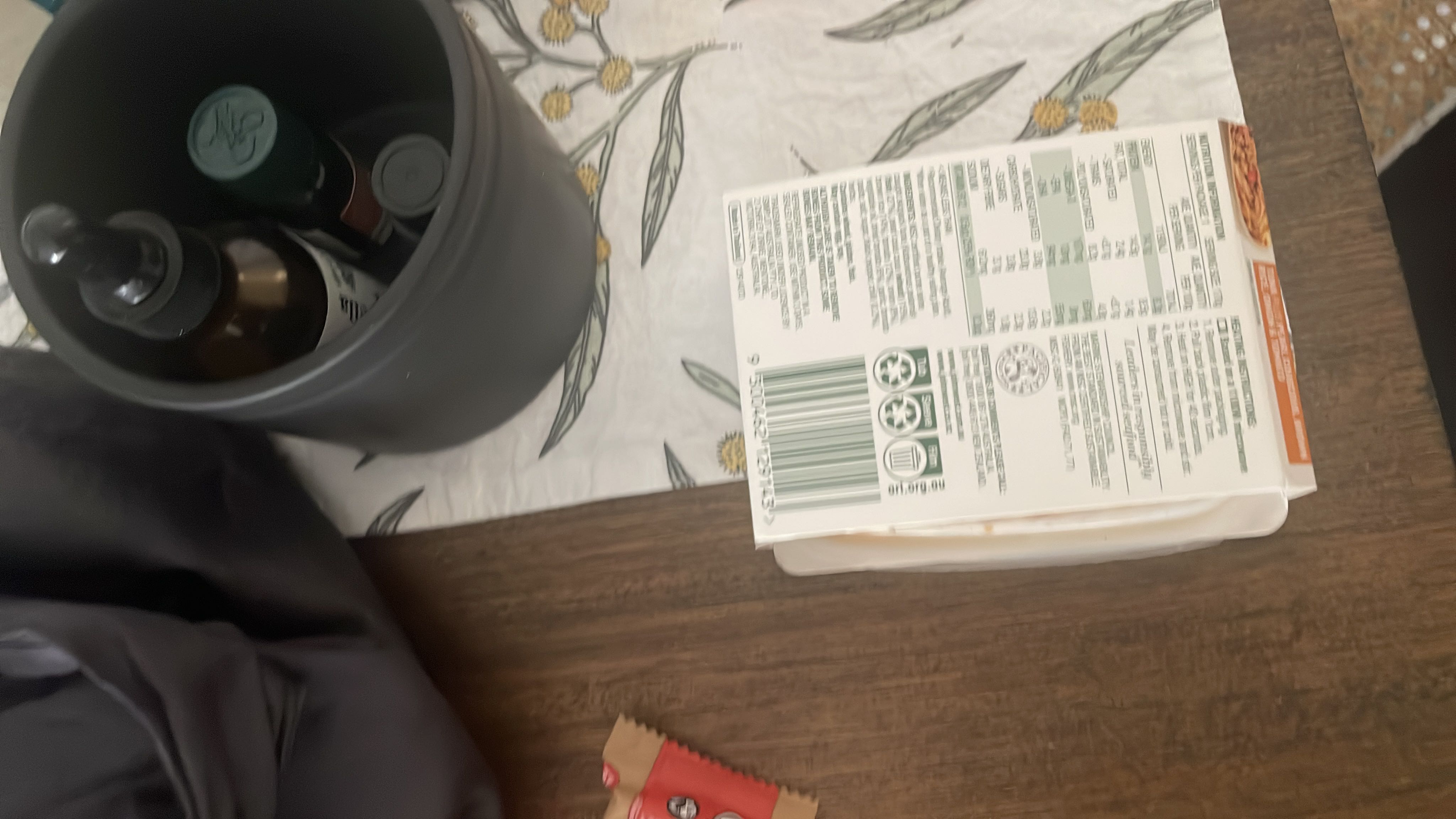The image contains a food package with nutritional information, but the text is not clear enough to extract specific details.