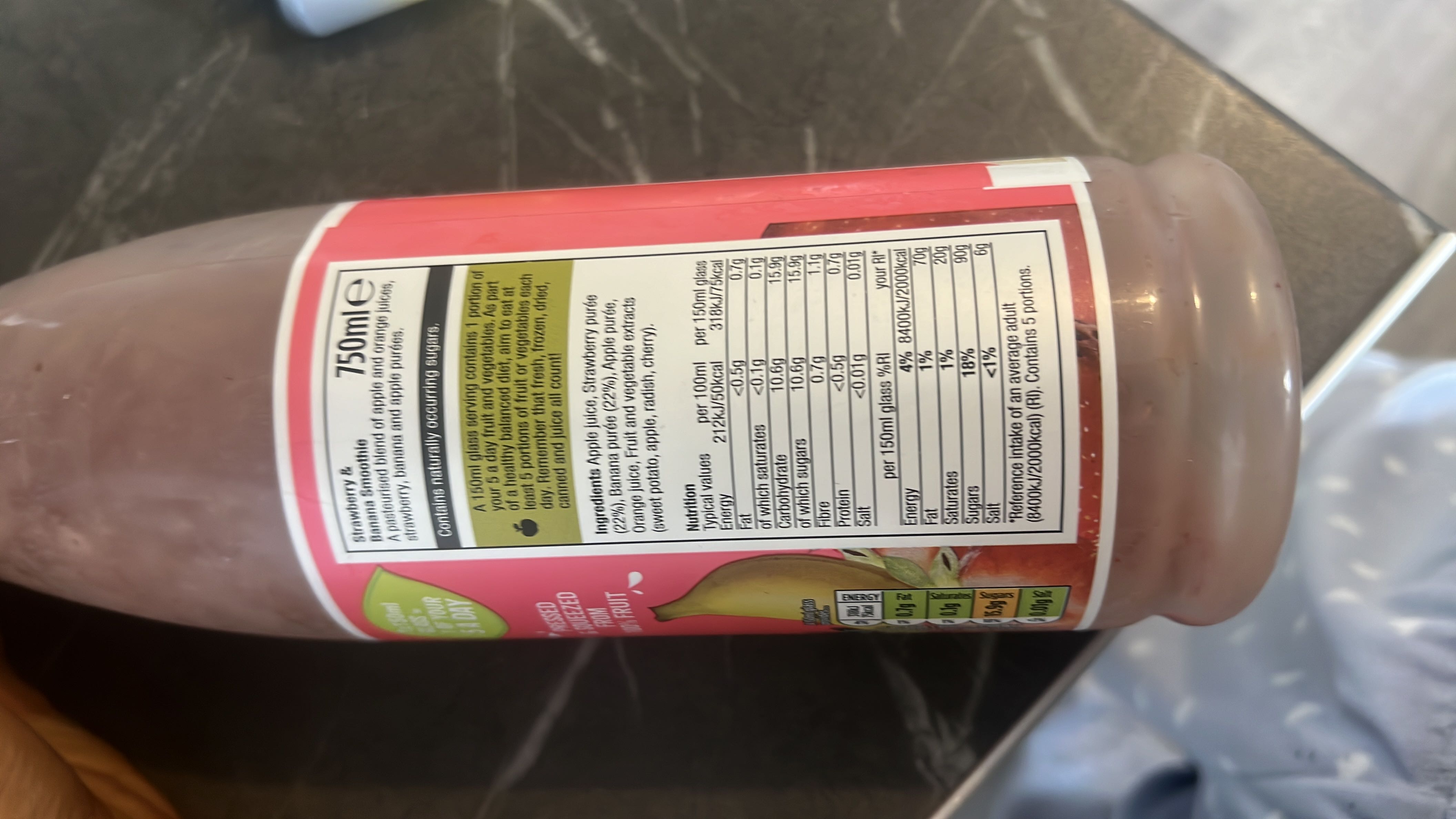A strawberry and banana smoothie made from apple juice, orange juice, strawberry purée, and banana purée, with naturally occurring sugars.