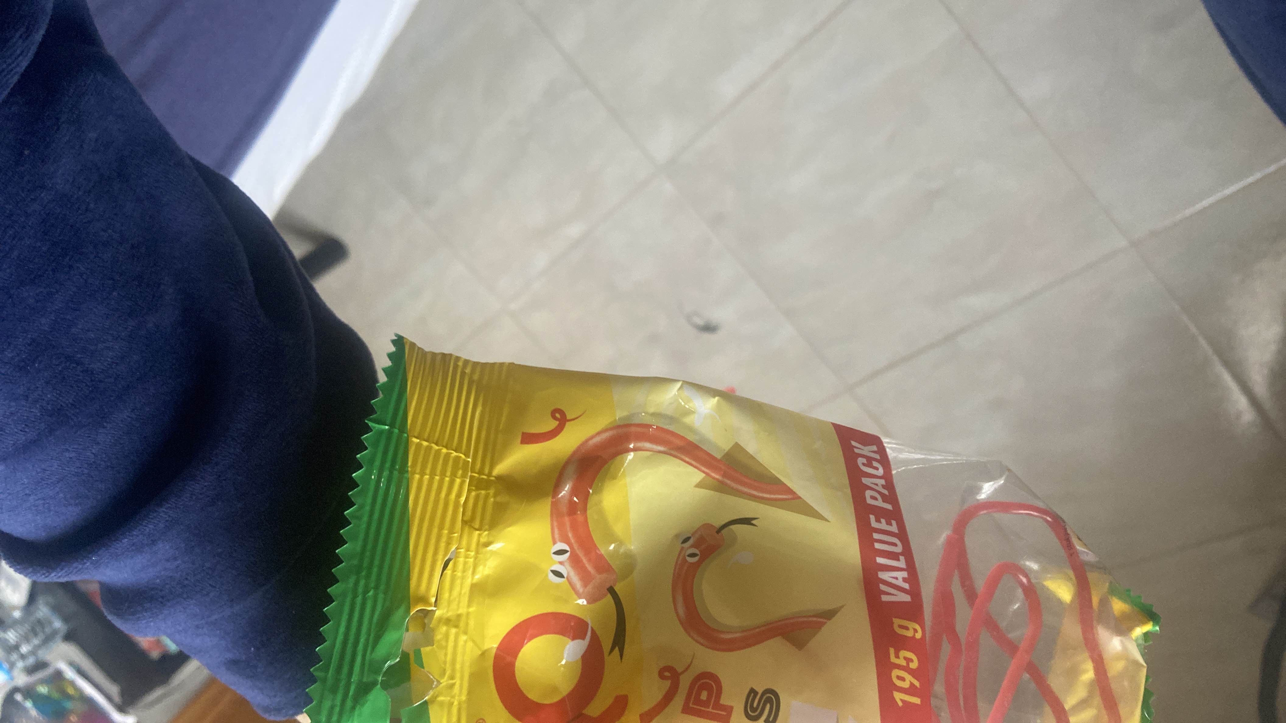 The image shows a 195g value pack of a snack product, but no specific nutritional information is visible.