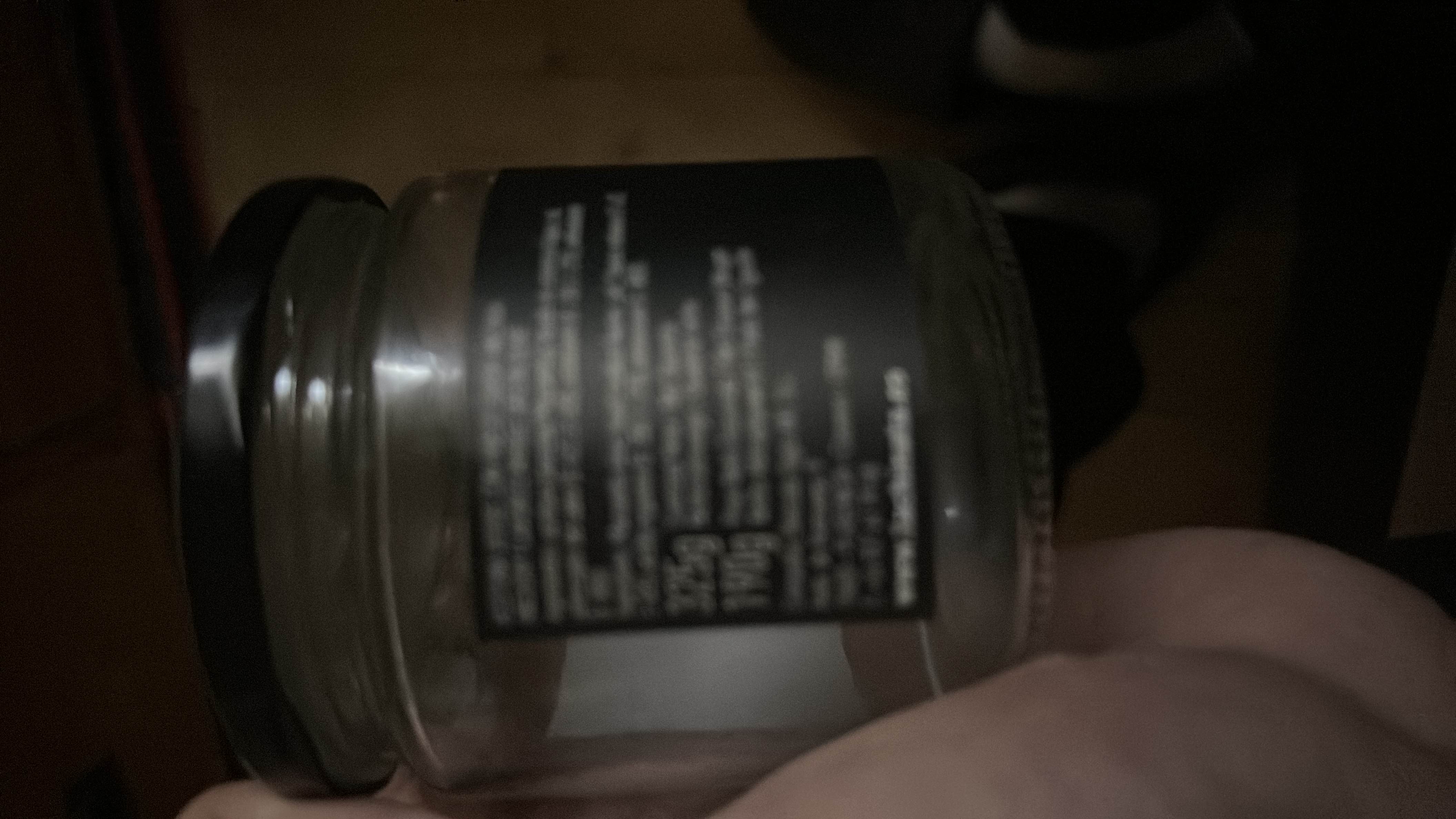 The image is too blurry to extract nutritional information.