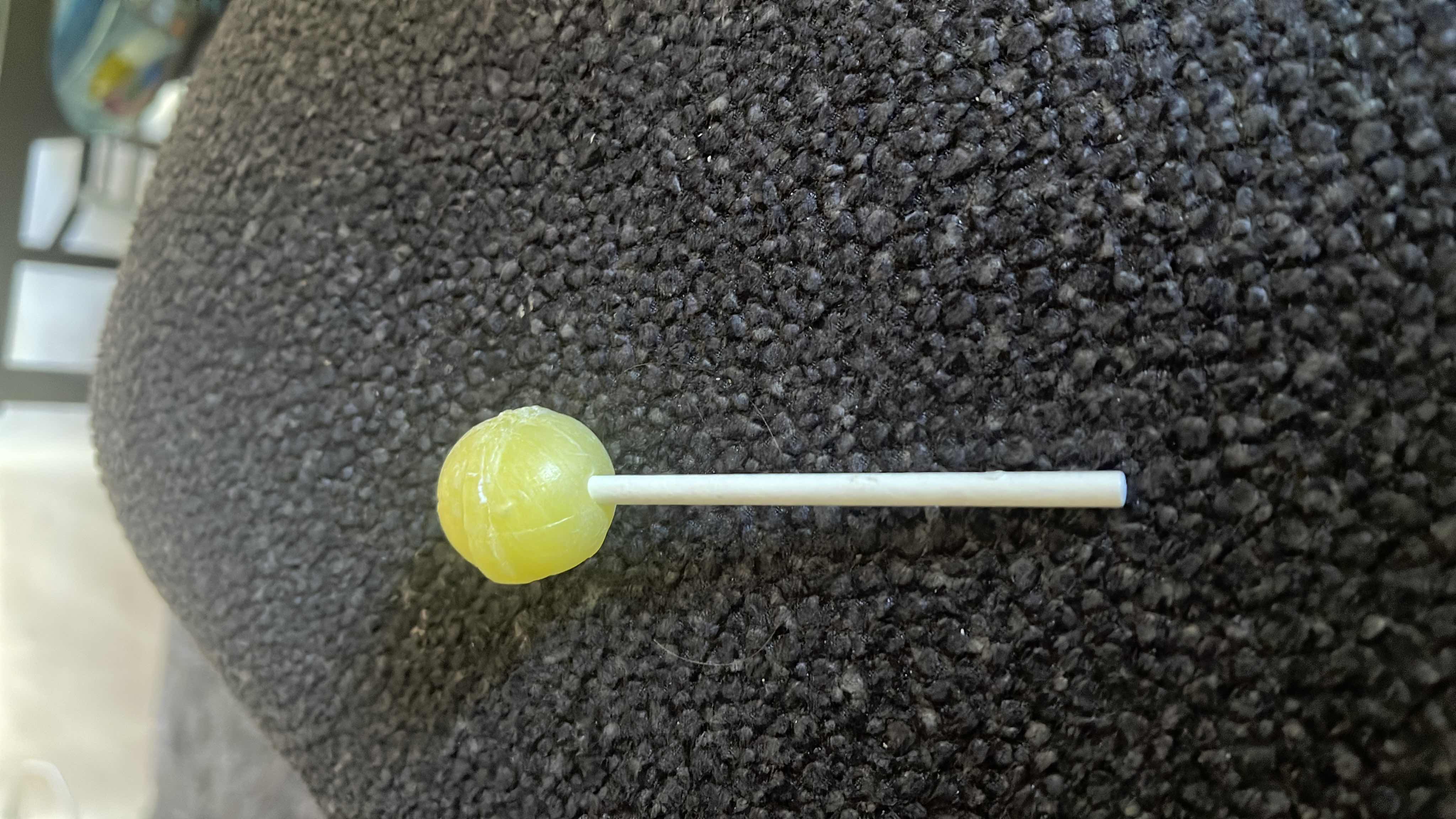 A single lollipop, primarily made of sugar, with minimal nutritional value.