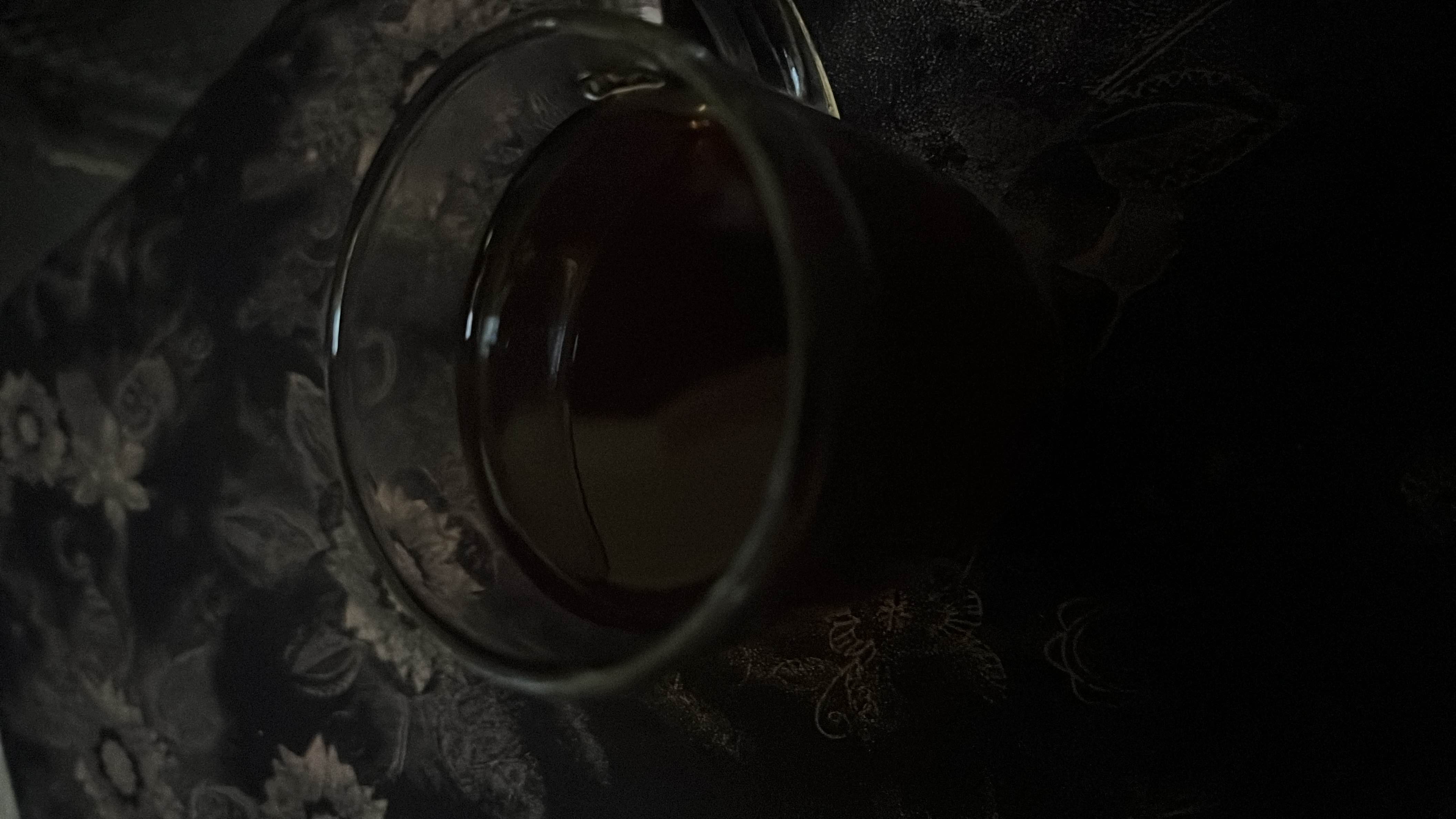 A cup of black coffee, low in calories and free of fats, carbs, and protein.