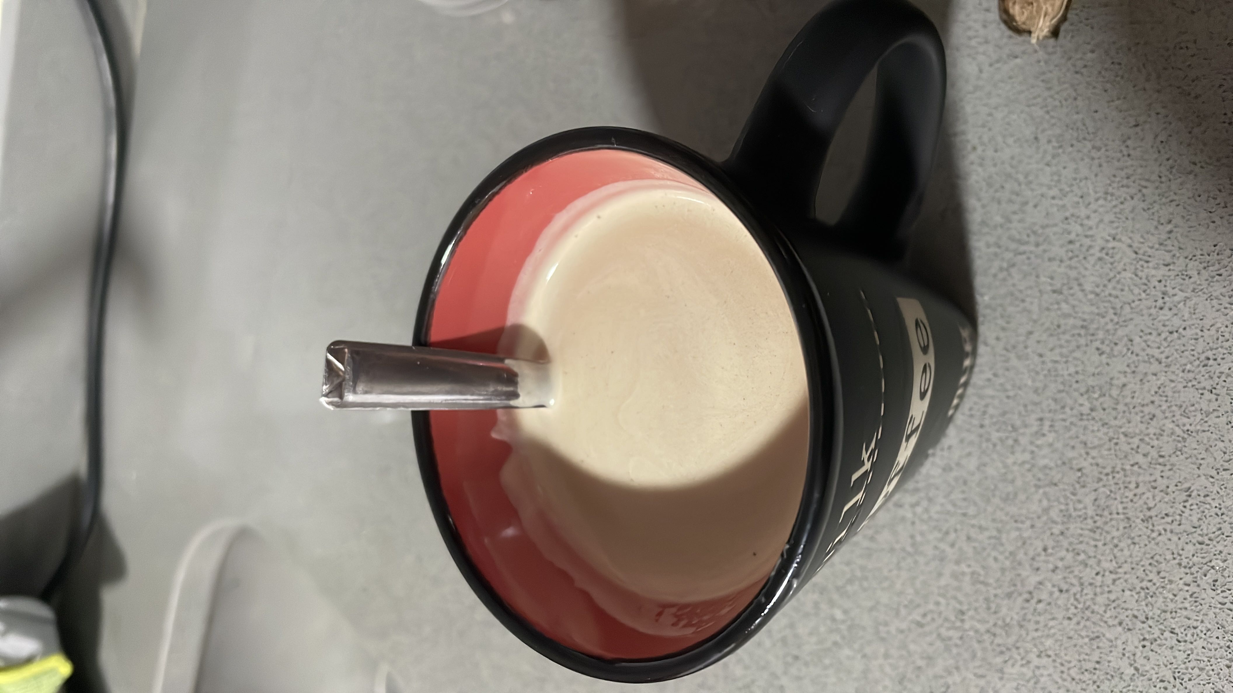 A cup of coffee with a tablespoon of milk, providing low calories and minimal macronutrients.