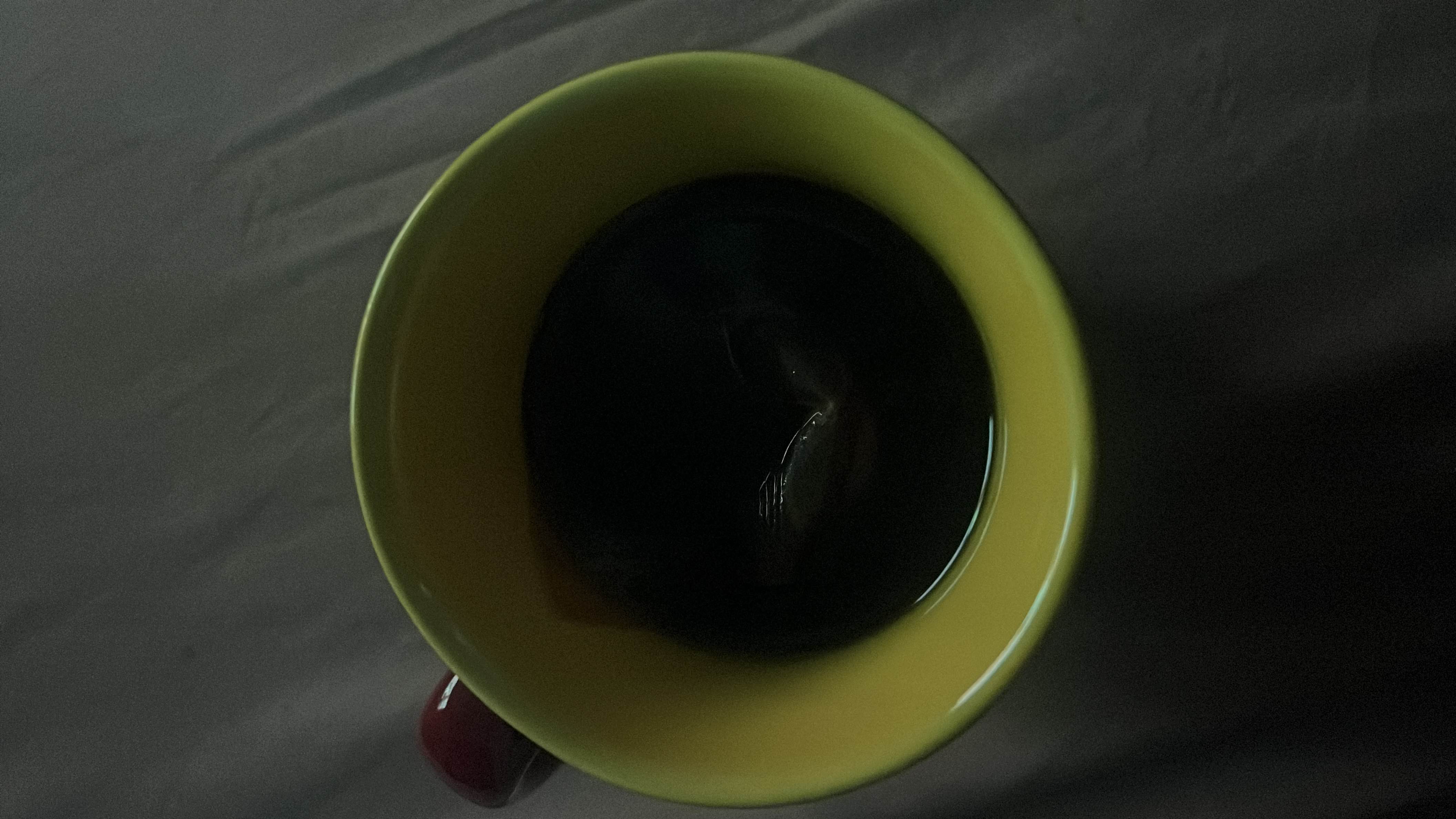A cup of black tea, low in calories and free of fats and proteins.