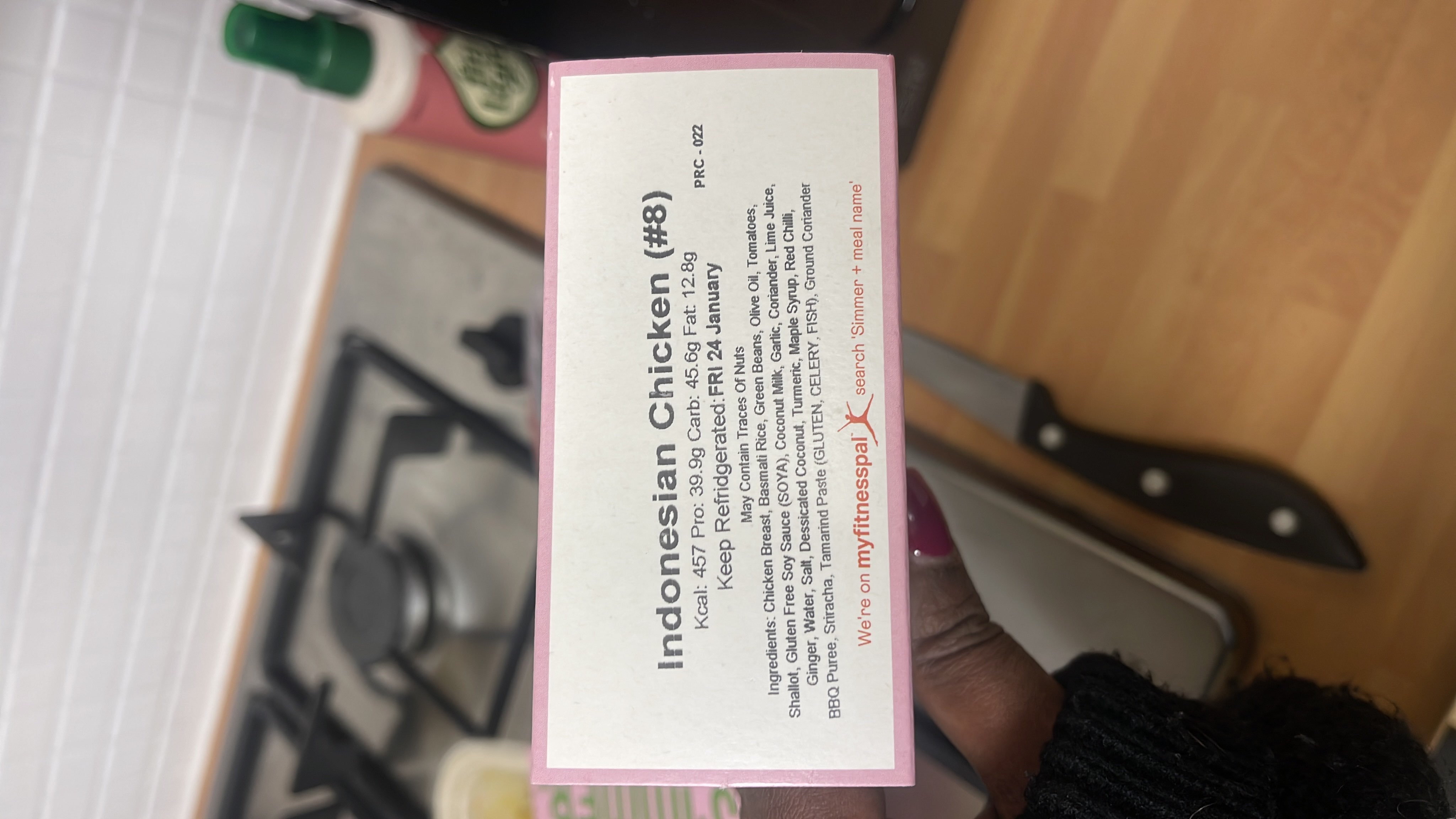 Indonesian Chicken meal with a balanced nutritional profile, featuring chicken breast, basmati rice, and vegetables, providing 457 kcal per serving.