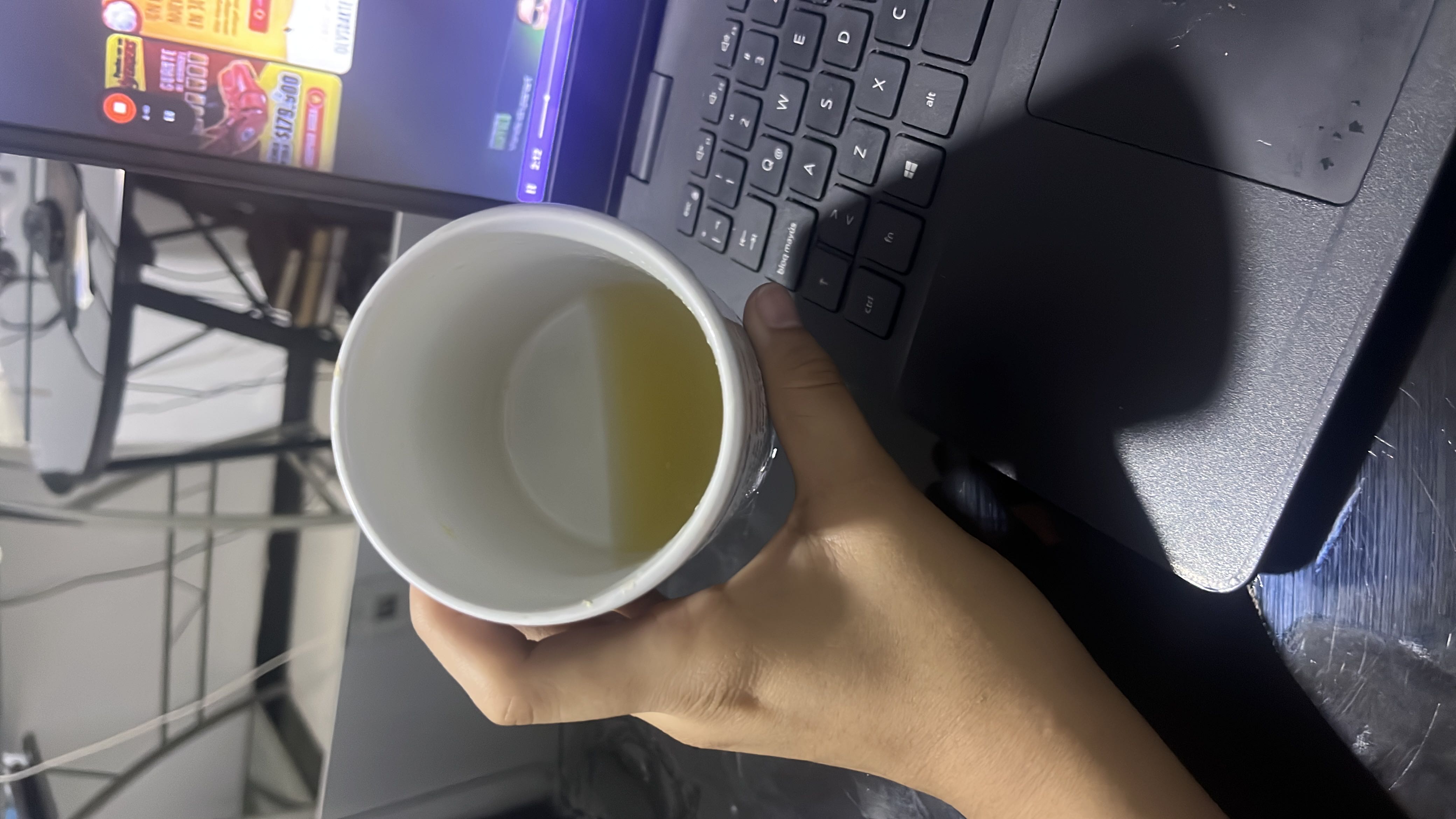 A cup of green tea, a low-calorie beverage known for its health benefits.
