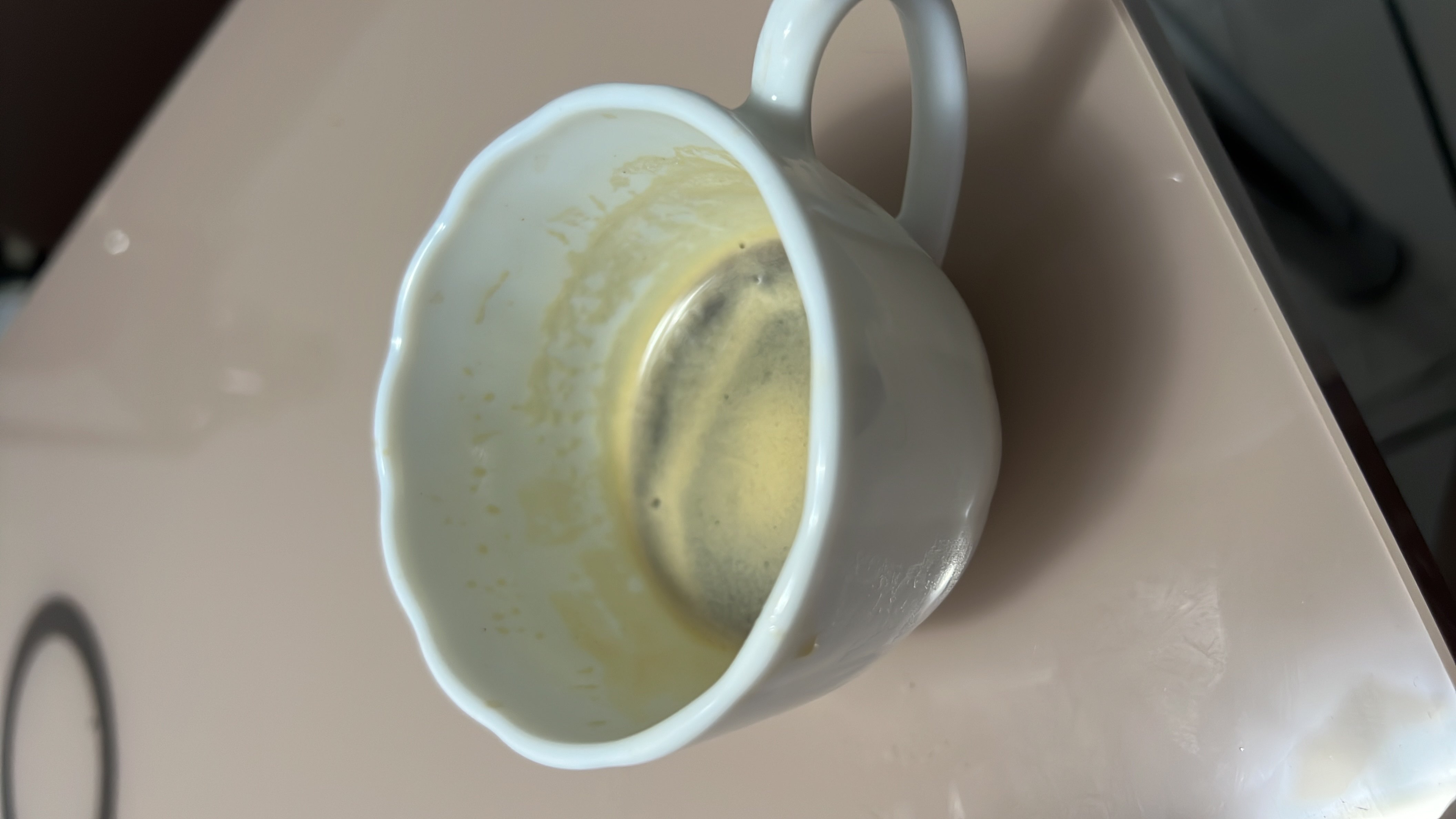 A cup of espresso with minimal calories, primarily consisting of water and coffee.