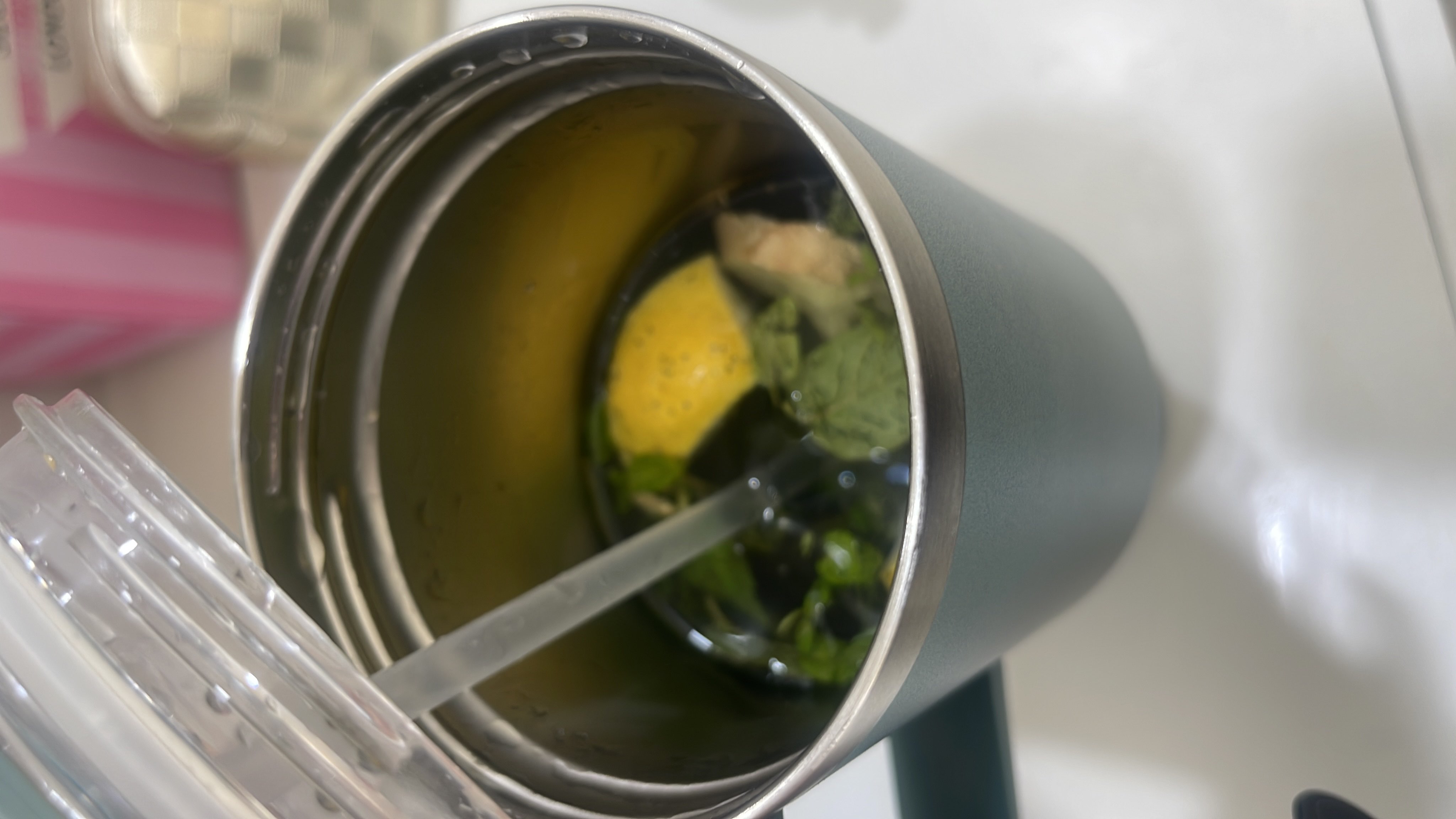 A refreshing drink made with water, lemon, and mint leaves, low in calories and high in hydration.